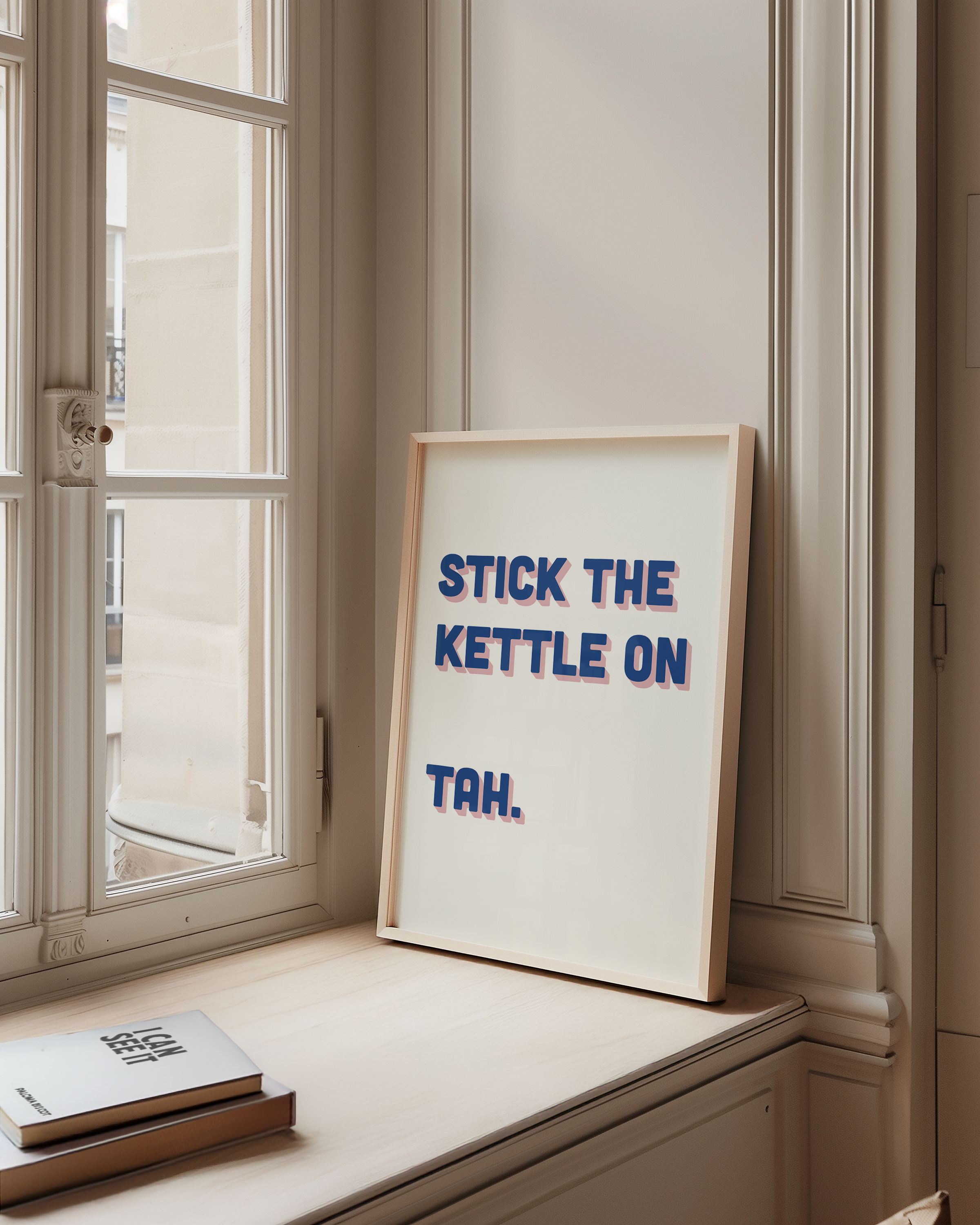 Funny quote print poster that says "Stick the Kettle On Tah" in two tone retro blue and pink font. British humour poster