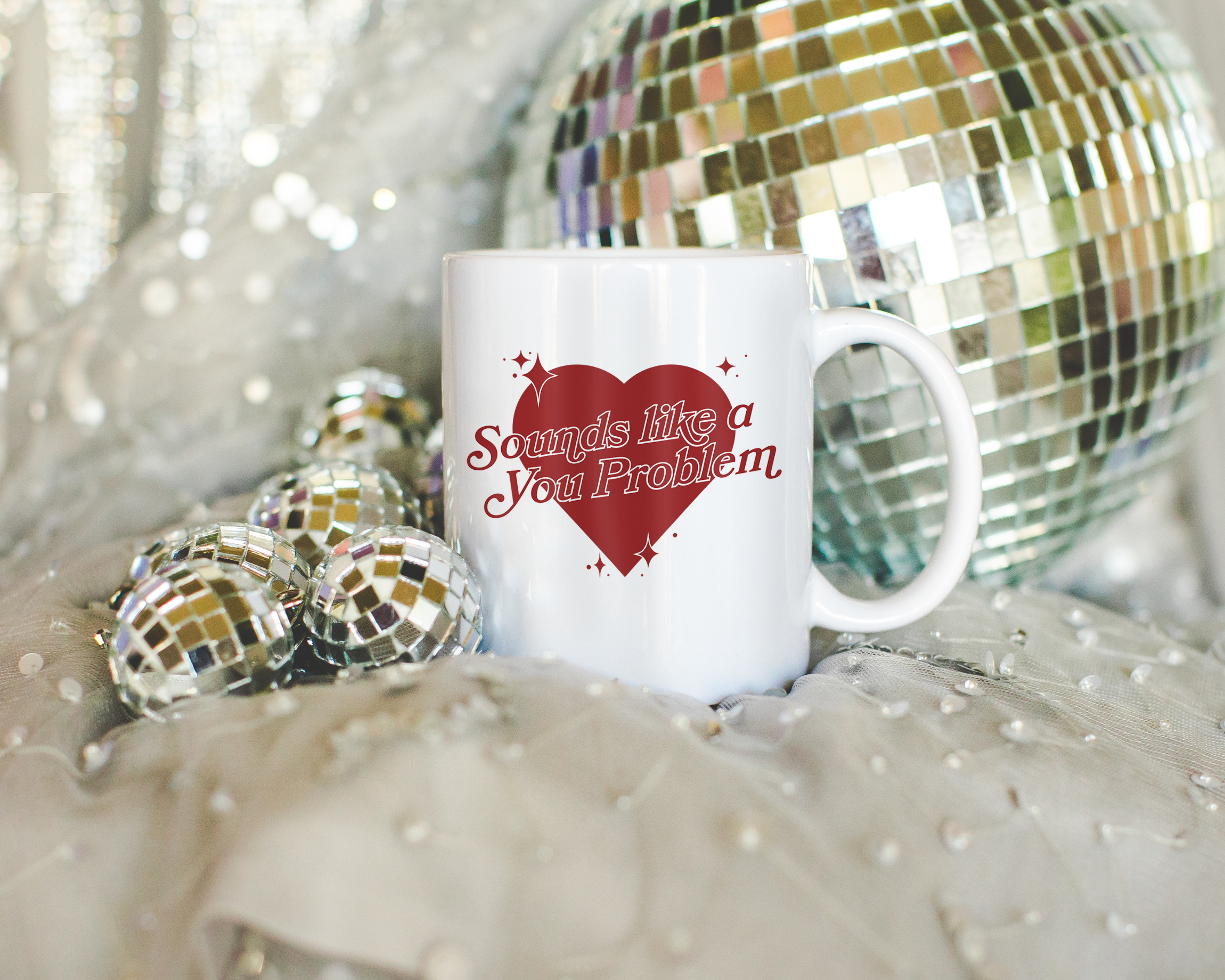 Sassy dopamine decor White coffee mug that says "Sounds like a you problem" in a retro vintage style heart that's red with a retro font.. Available in 11oz and 15oz