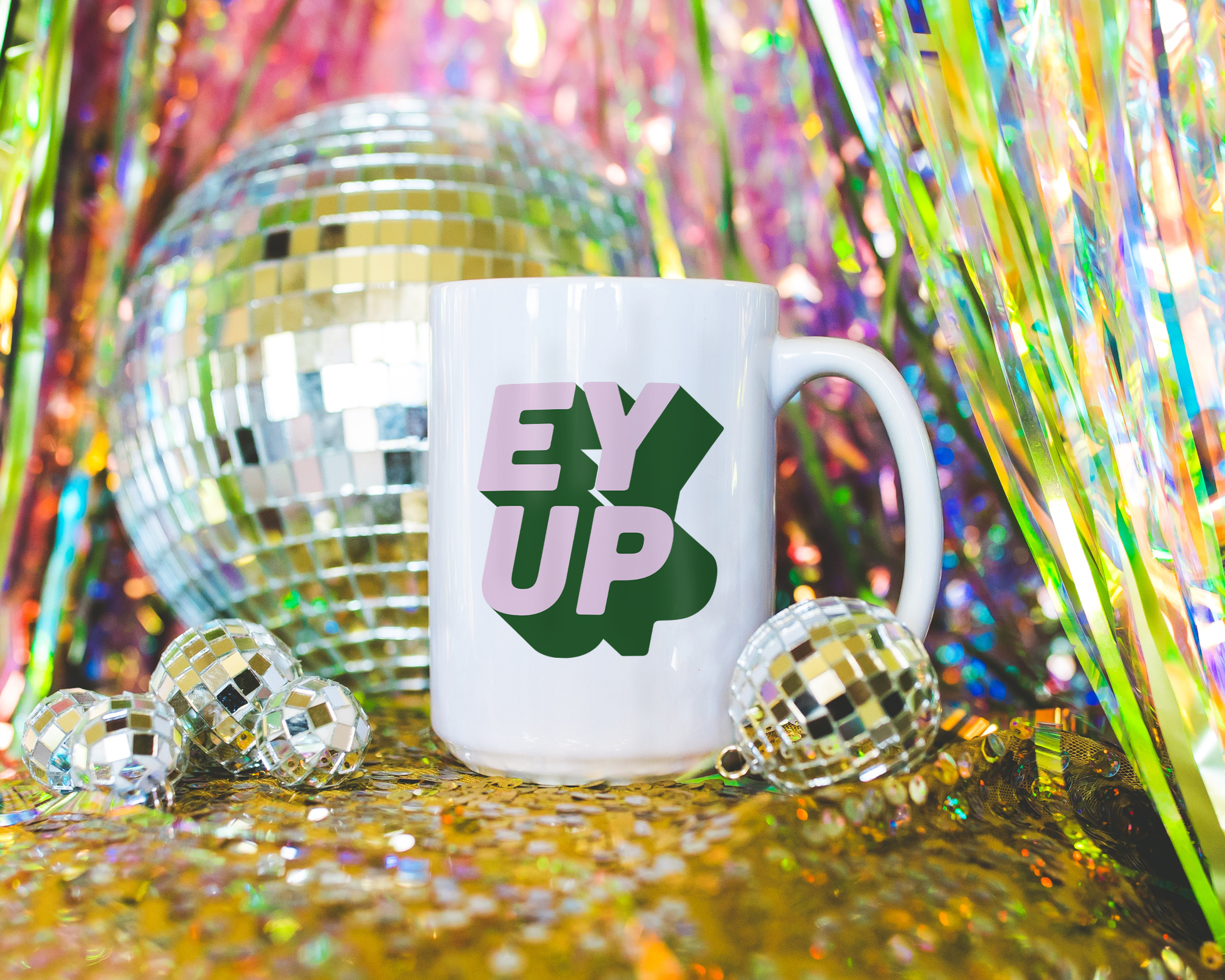 Sassy dopamine decor White coffee mug that says "ey up" in a retro two tone vintage style pink and green font. Available in 11oz and 15oz. British humour
