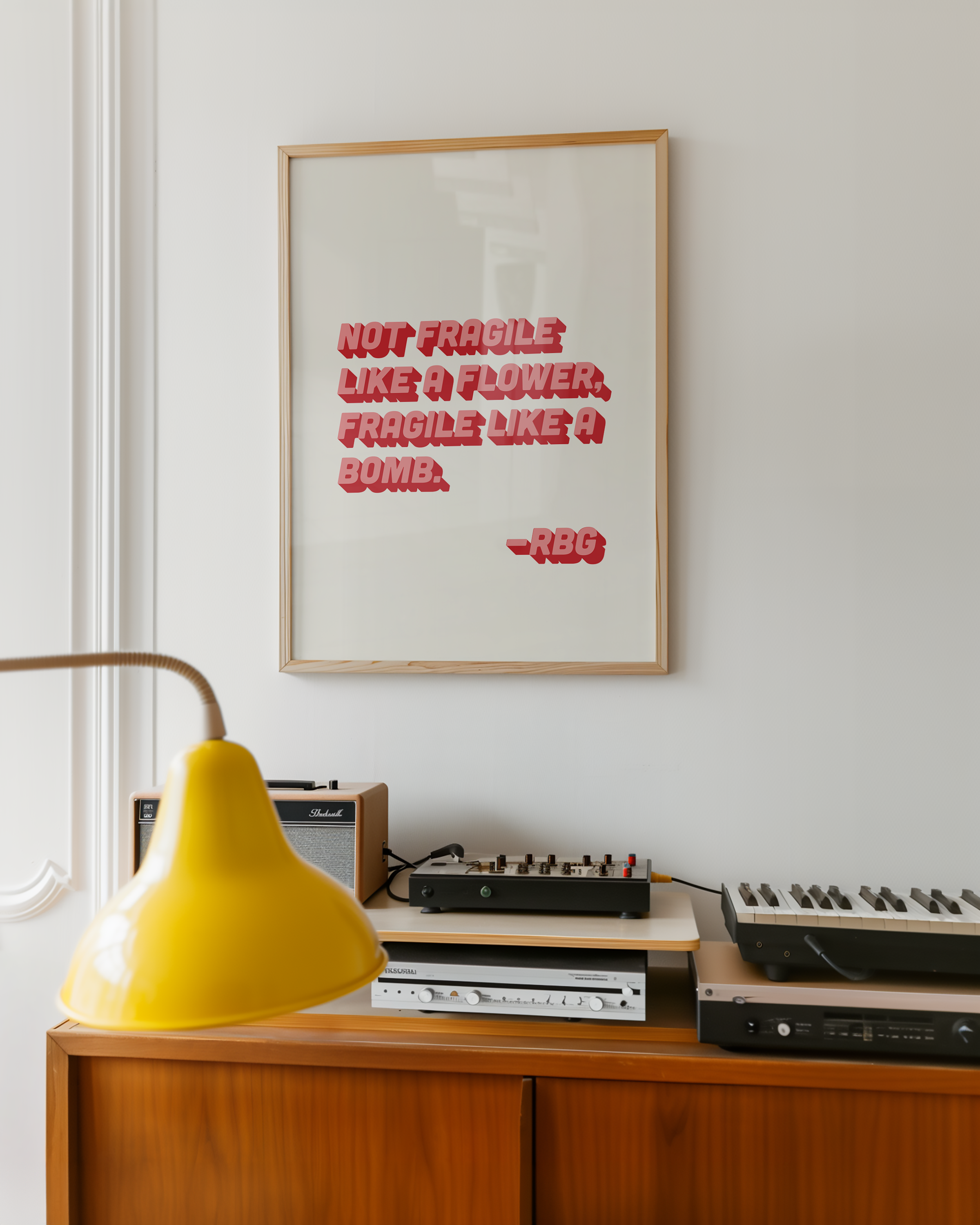 bold dopamine decor ruth bader ginsburg quote print poster "Not Fragile Like a Flower, Fragile Like a Bomb." Feminist print poster. Retro two tone font in pink and red