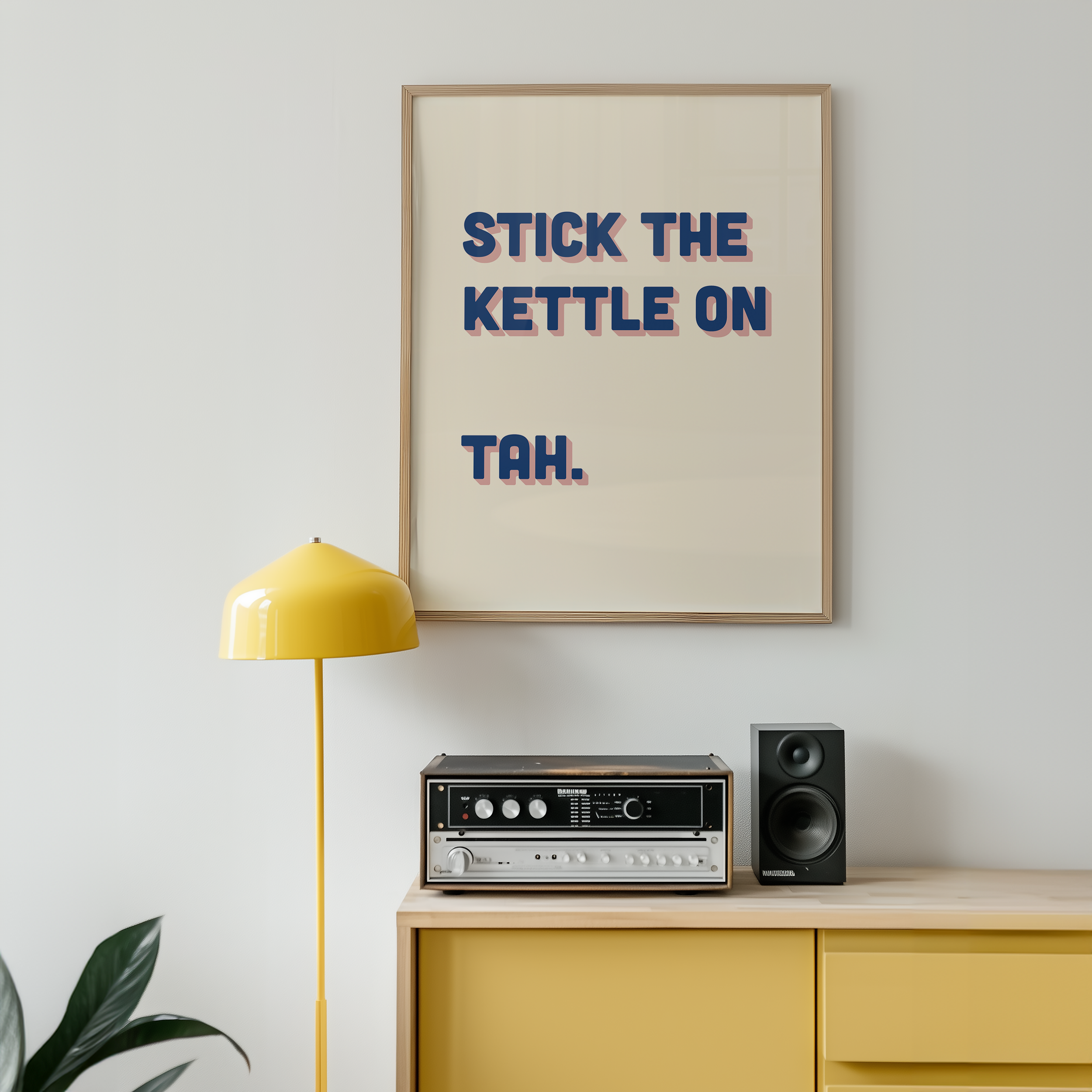 Funny quote print poster that says "Stick the Kettle On Tah" in two tone retro blue and pink font. British humour poster