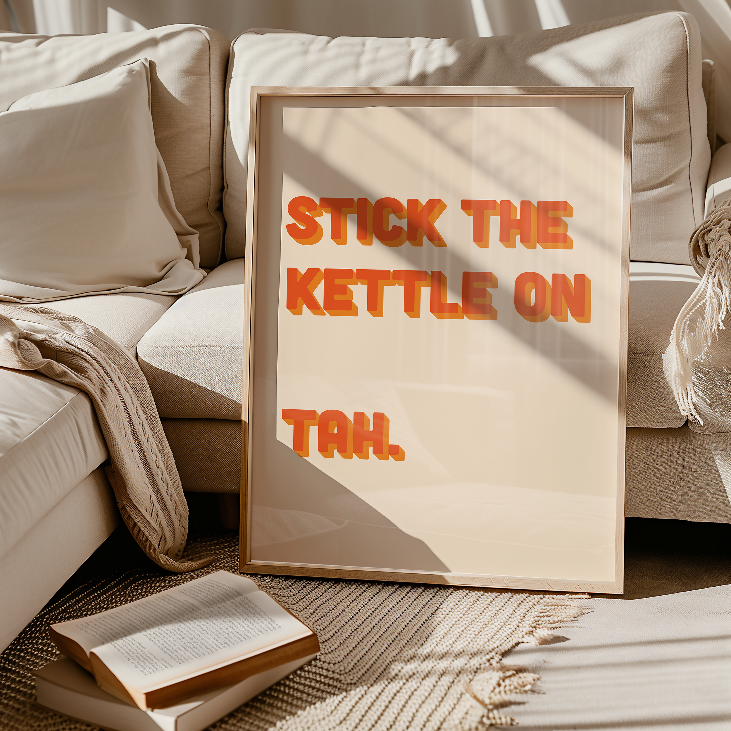 Funny quote print poster that says "Stick the Kettle On Tah" in two tone retro orange font. British humour poster