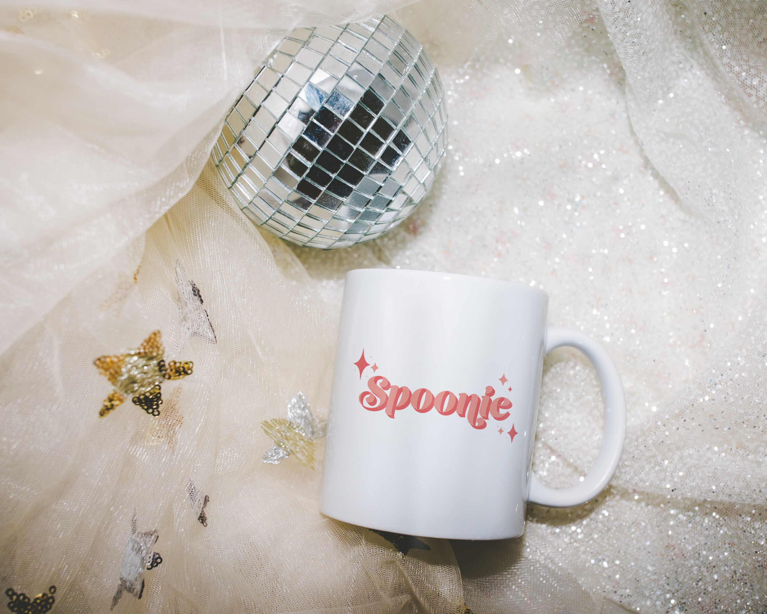 Sassy dopamine decor White coffee mug that says "Spoonie" in a retro vintage style pink font. Available in 11oz and 15oz