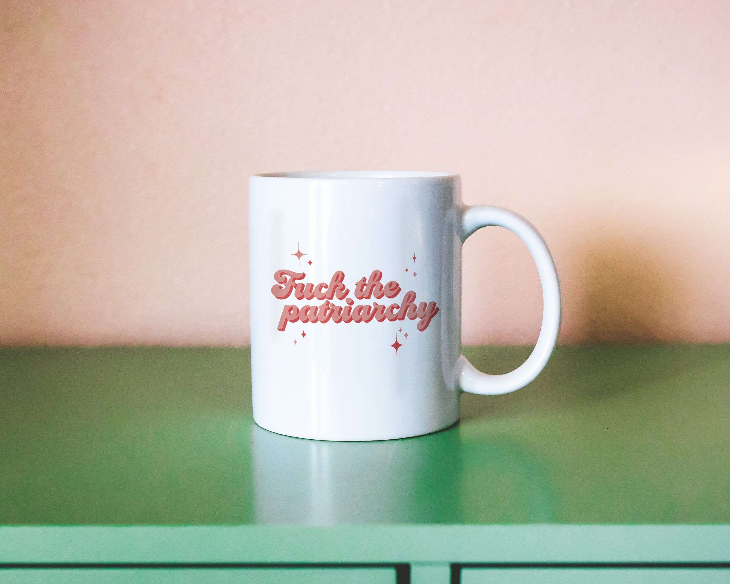 Sassy dopamine decor White coffee mug that says "fuck the patriarchy" in a retro vintage style red font. Available in 11oz and 15oz