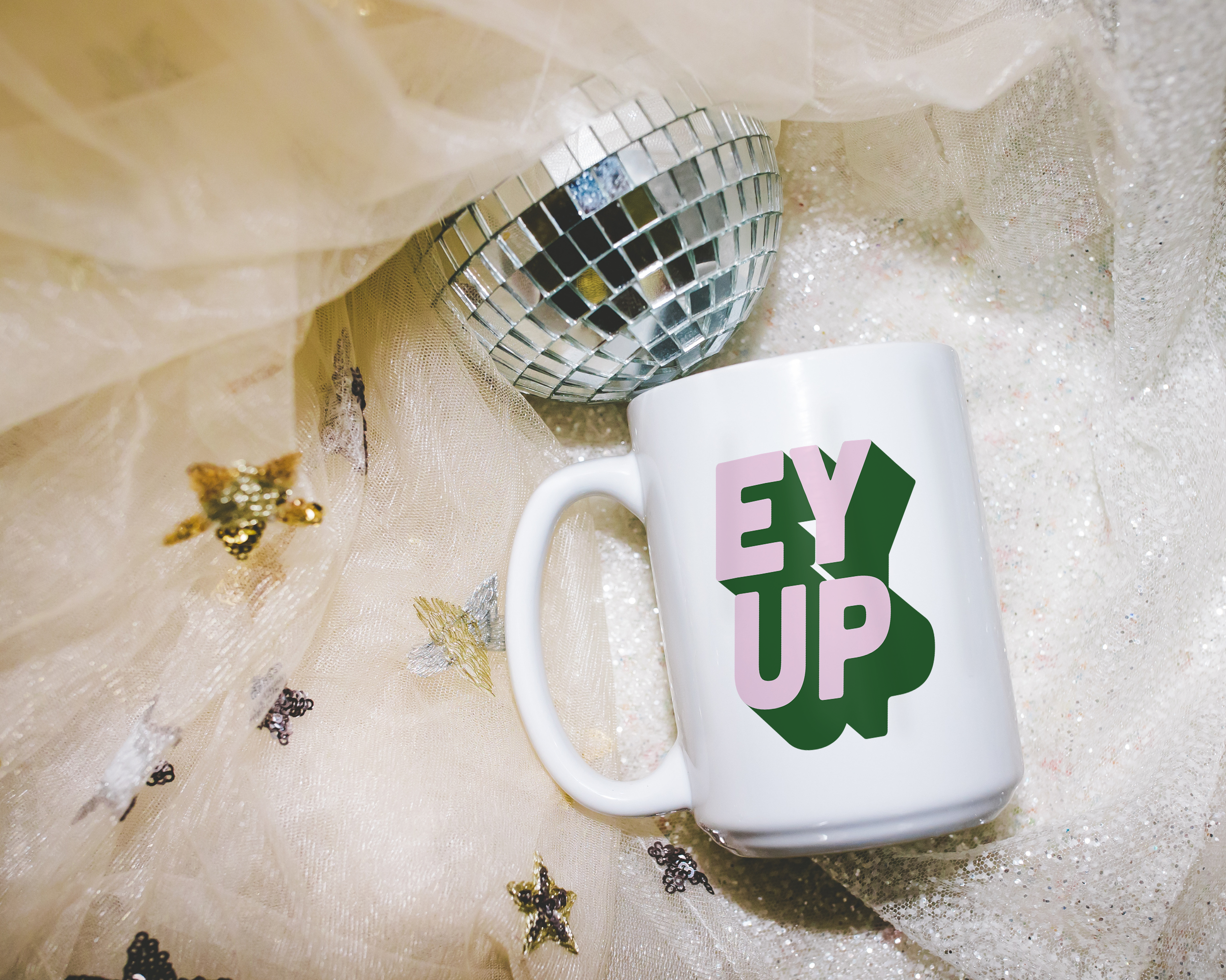 Sassy dopamine decor White coffee mug that says "ey up" in a retro two tone vintage style pink and green font. Available in 11oz and 15oz. British humour