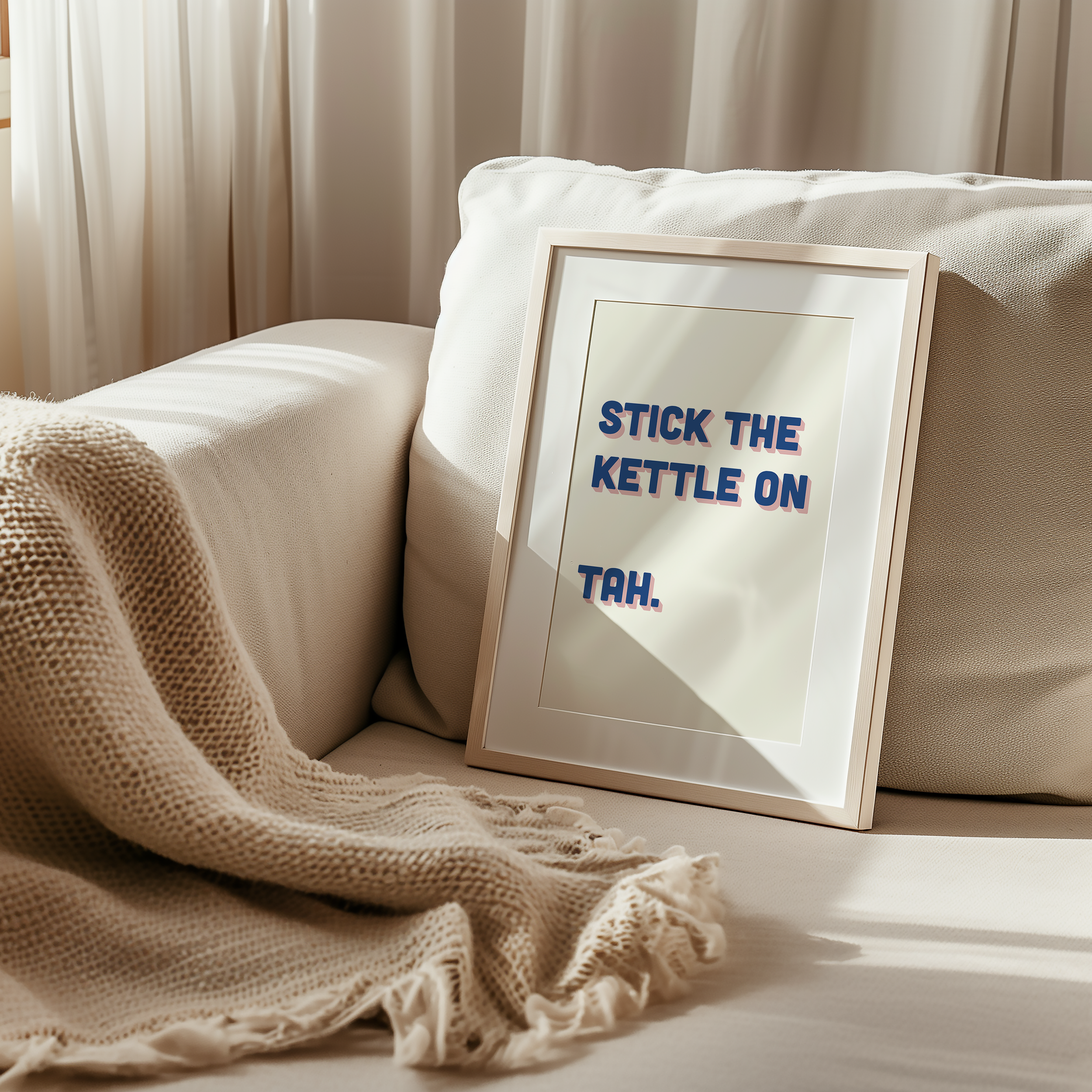 Funny quote print poster that says "Stick the Kettle On Tah" in two tone retro blue and pink font. British humour poster