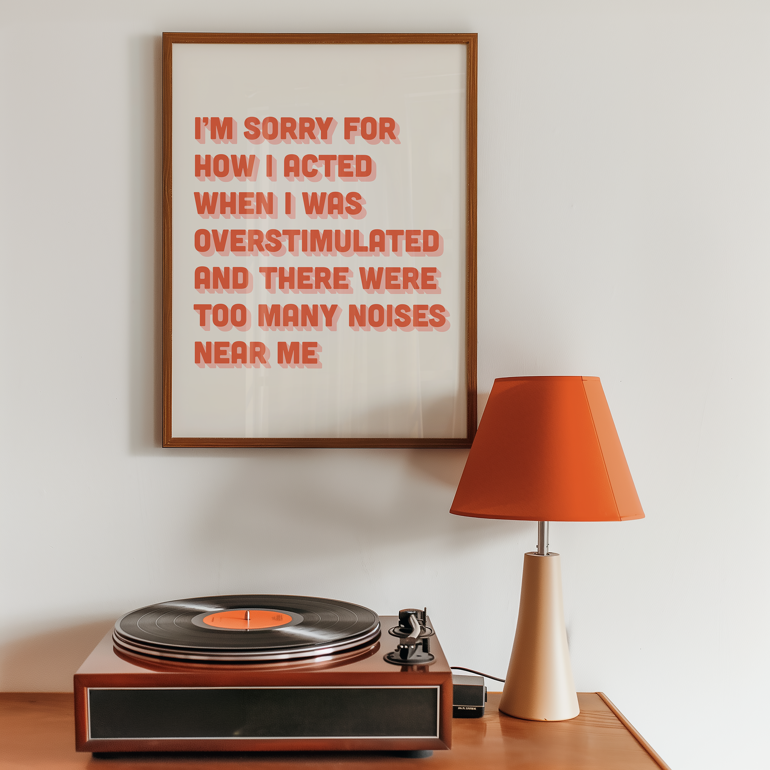 Funny neurodivergent print about being overstimulated that says “I’m sorry for how I acted when I was overstimulated and there were too many noises near me.” in two tone Pink and Red retro font