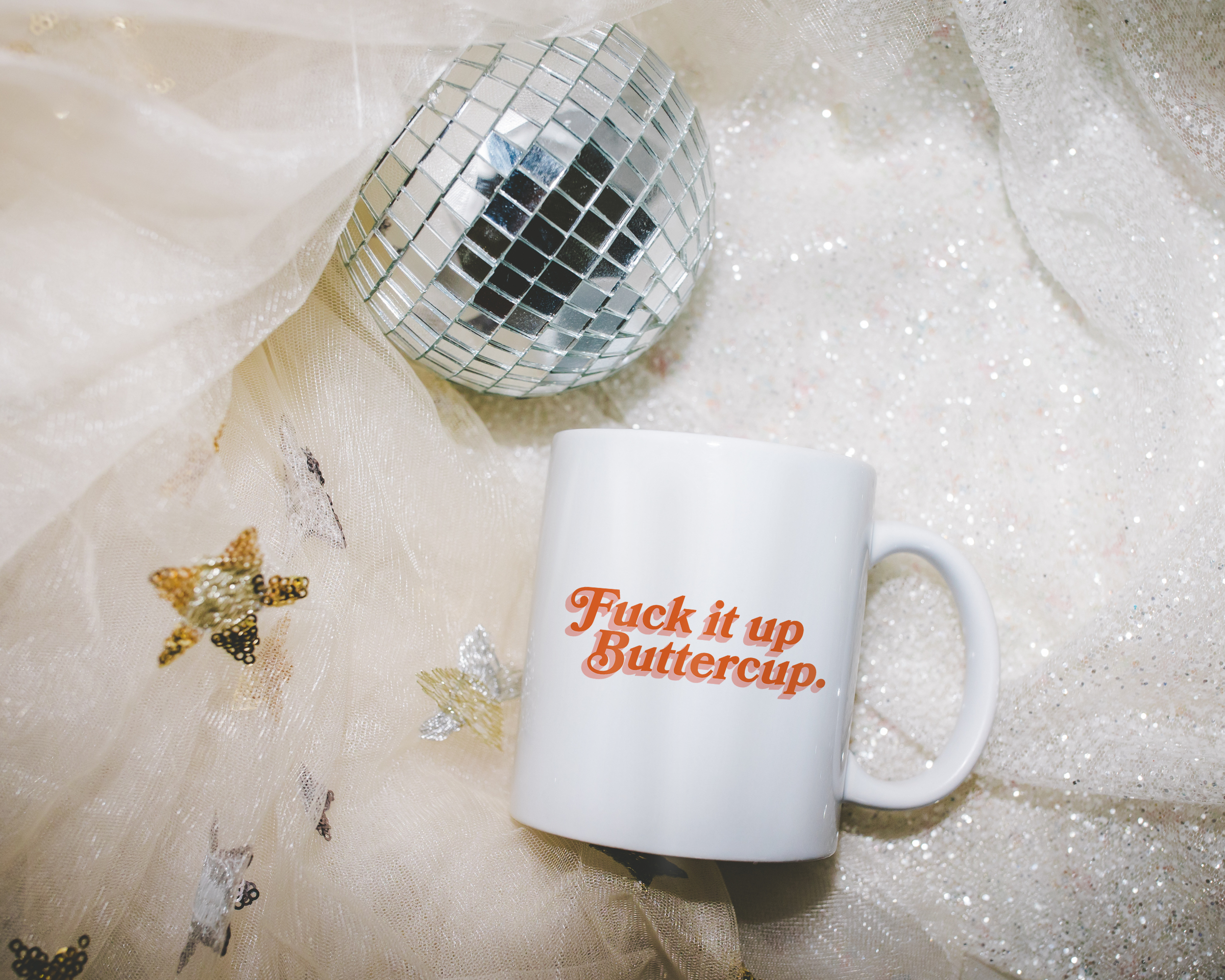 Sassy dopamine decor White coffee mug that says "Fuck it up buttercup" in a retro vintage font that's orange. Available in 11oz and 15oz