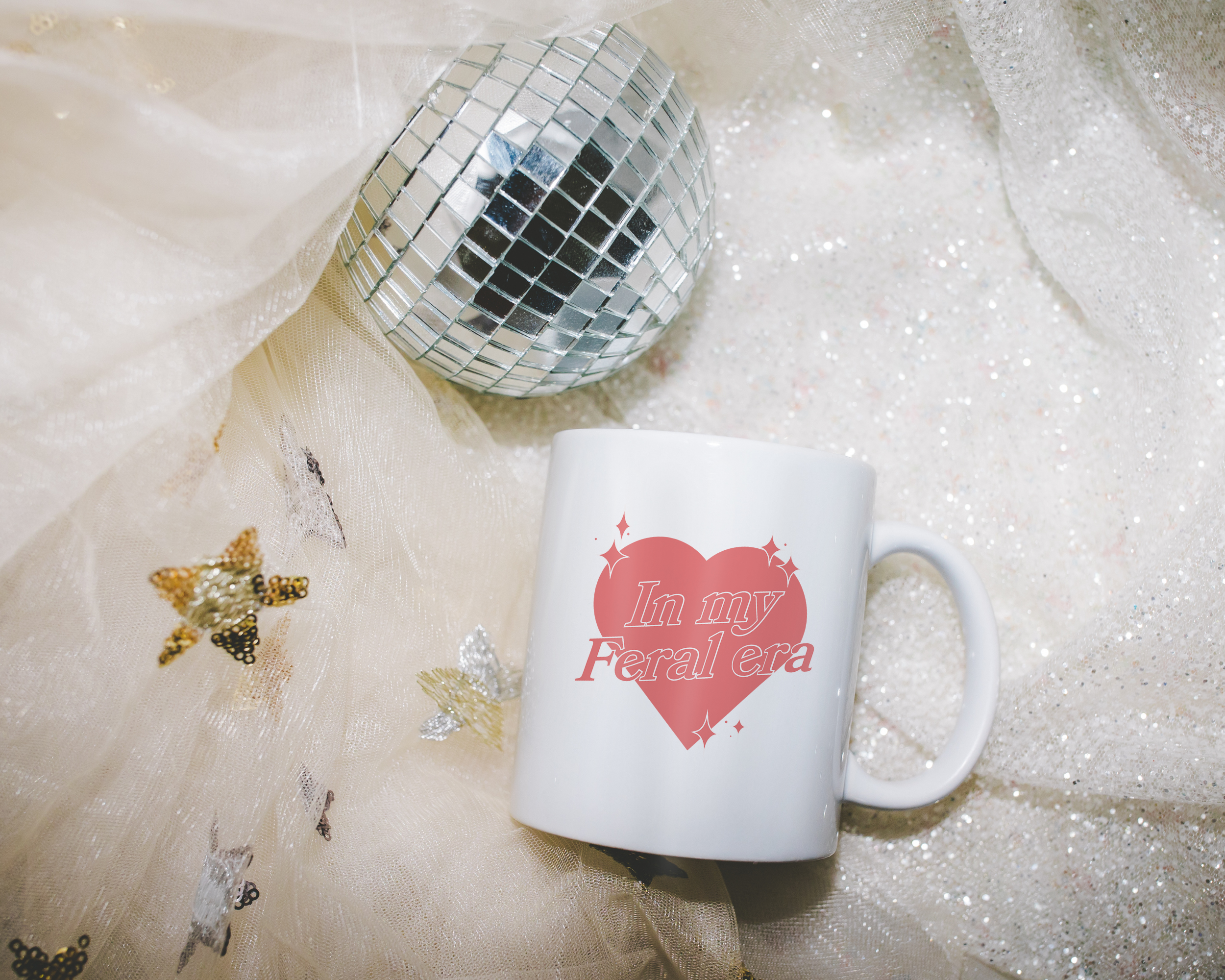 Sassy dopamine decor White coffee mug that says "In my feral era" in a retro vintage style heart that's pink with a retro font.. Available in 11oz and 15oz