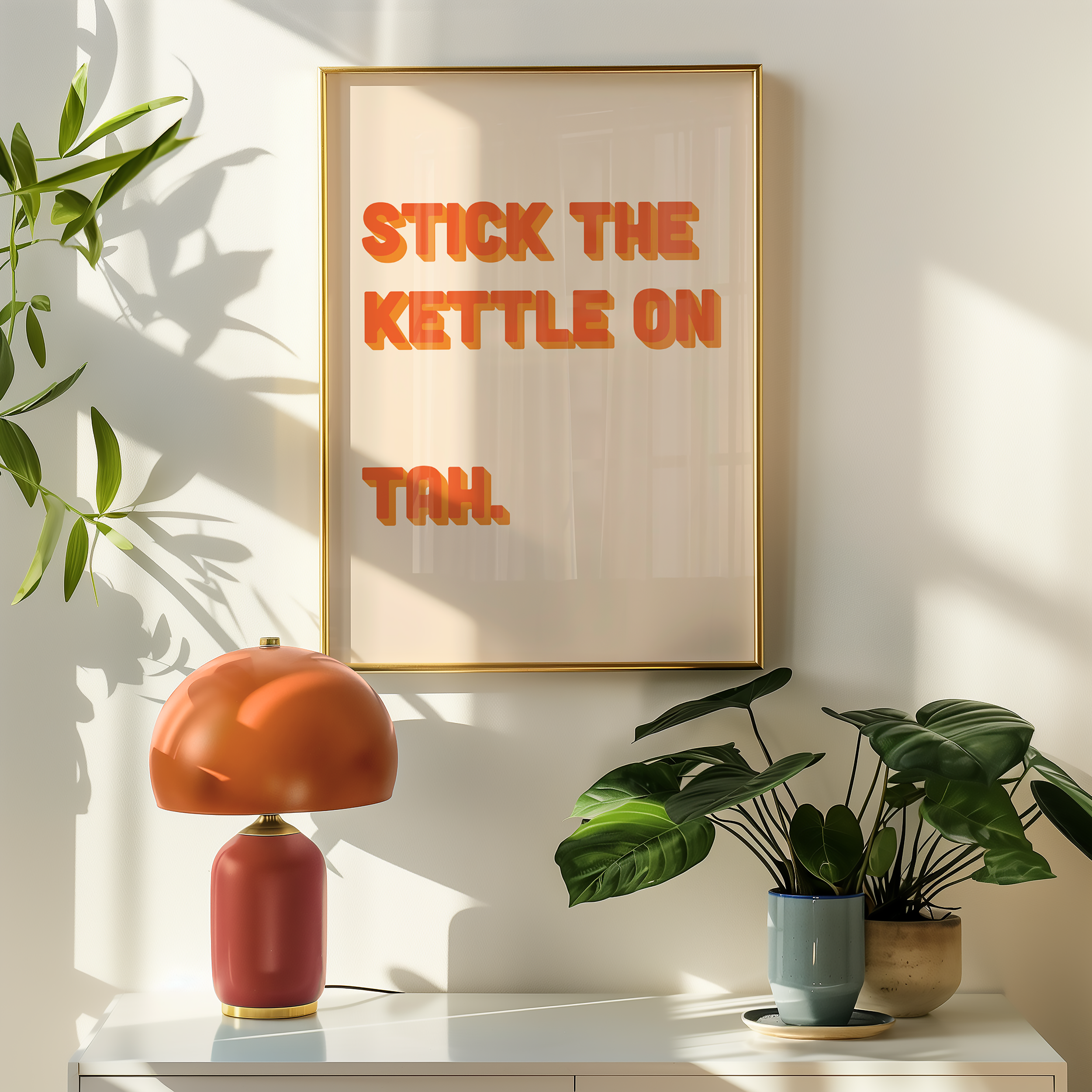 Funny quote print poster that says "Stick the Kettle On Tah" in two tone retro orange font. British humour poster