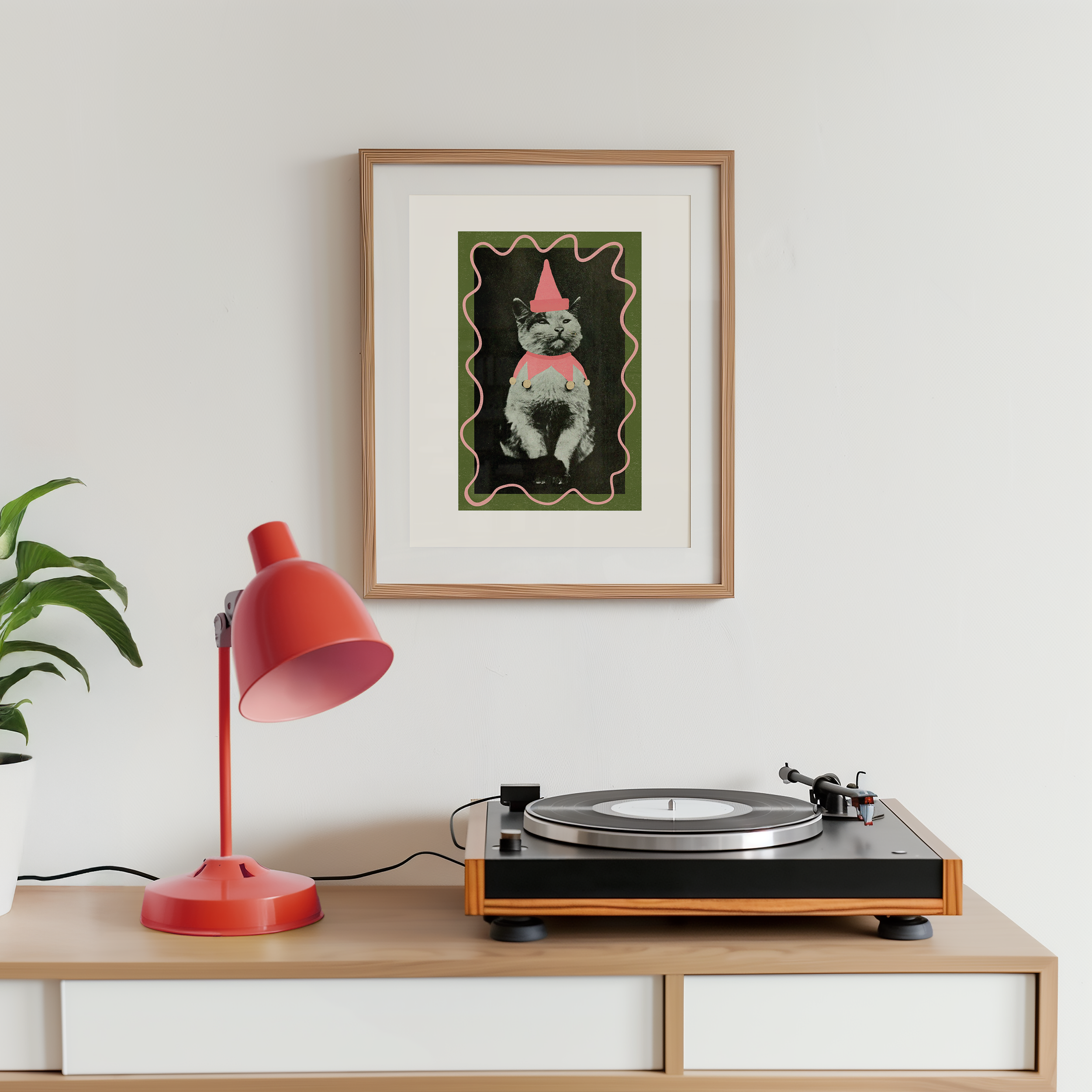 Dopamine decor poster print. Victorian photography pf cat wearing a jester costume, enhances with modern colour elements of pink and green