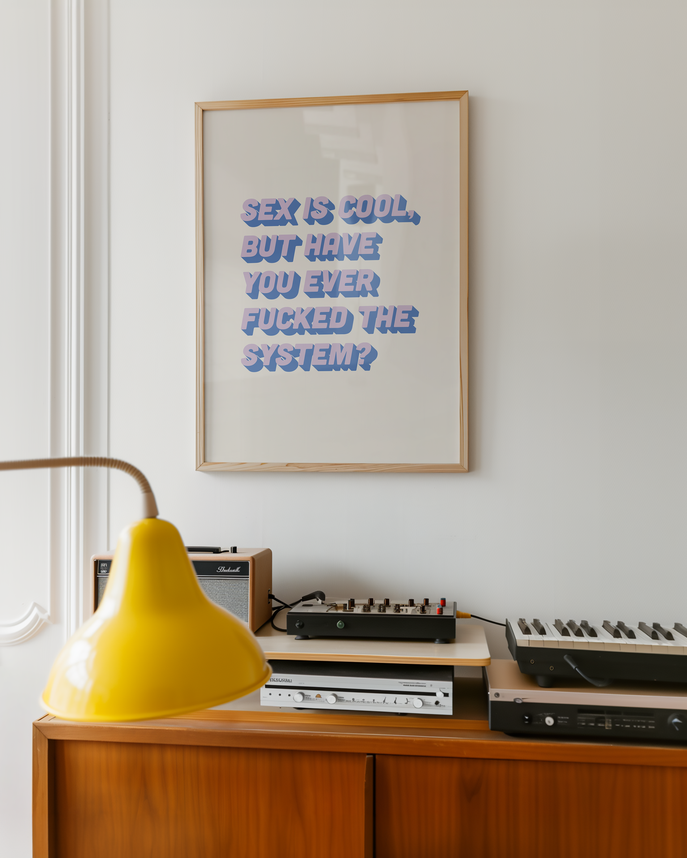 Bold dopamine decor feminist print poster that says "Sex is Cool But Have You Ever Fucked the System?" in retro two tone font in blue.