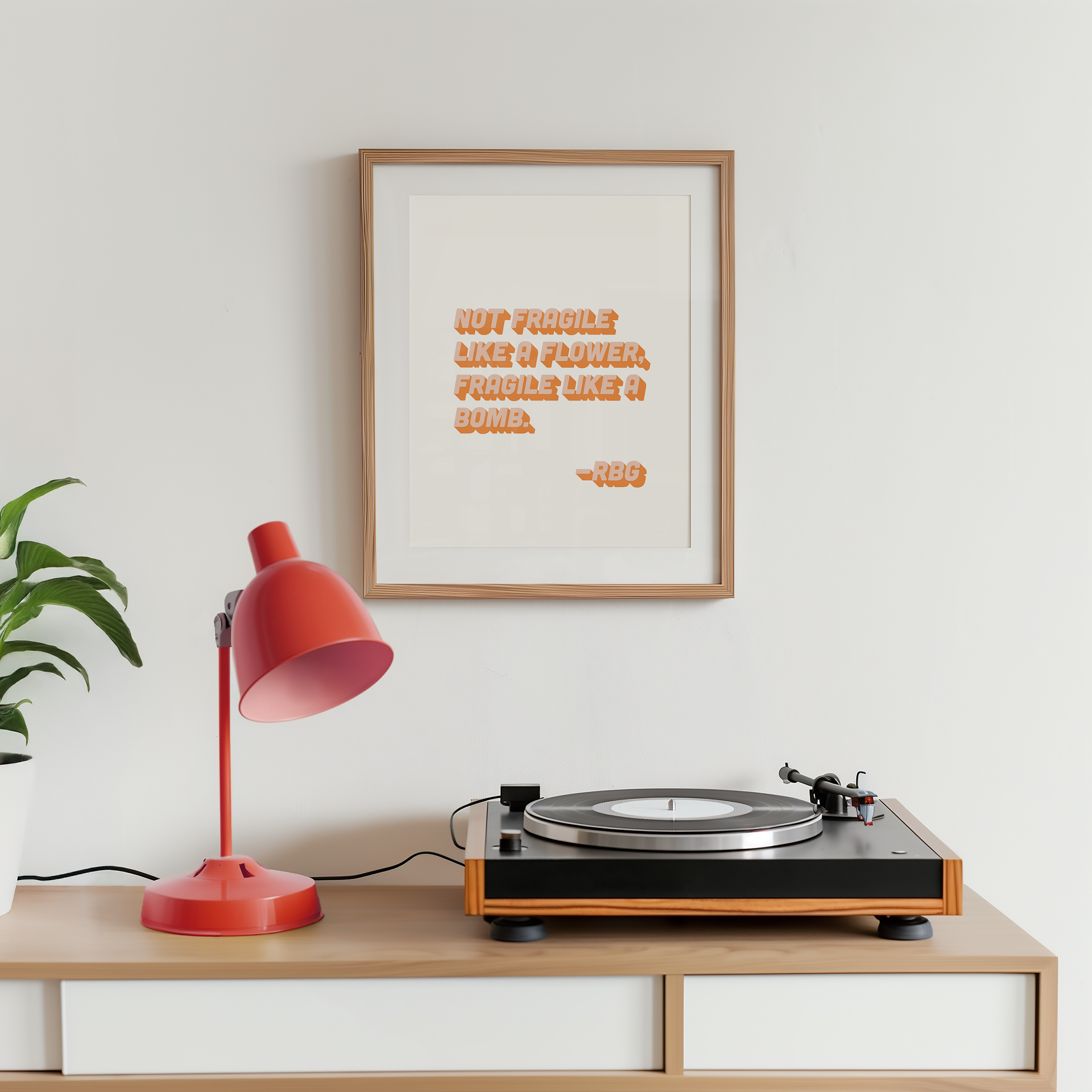 bold dopamine decor ruth bader ginsburg quote print poster "Not Fragile Like a Flower, Fragile Like a Bomb." Feminist print poster. Retro two tone font in orange