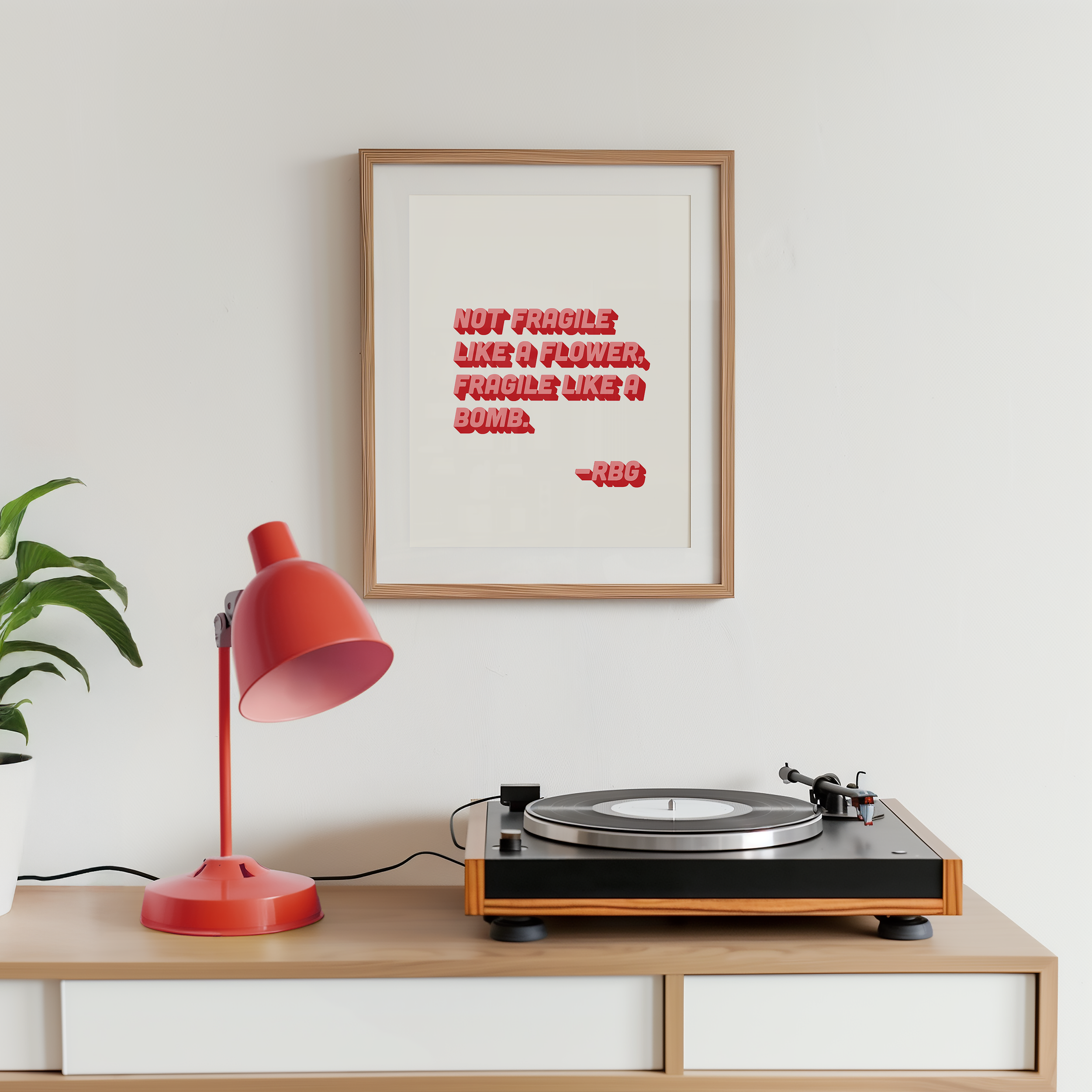 bold dopamine decor ruth bader ginsburg quote print poster "Not Fragile Like a Flower, Fragile Like a Bomb." Feminist print poster. Retro two tone font in pink and red