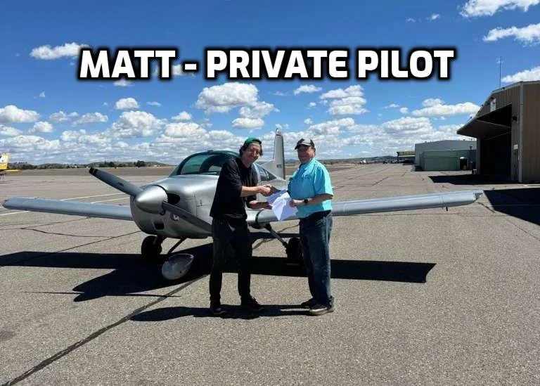 Two men in front of a small private airplane on an airport tarmac, with one handing the other a paper, under a blue sky with scattered clouds. The text above says 'MATT - PRIVATE PILOT'.