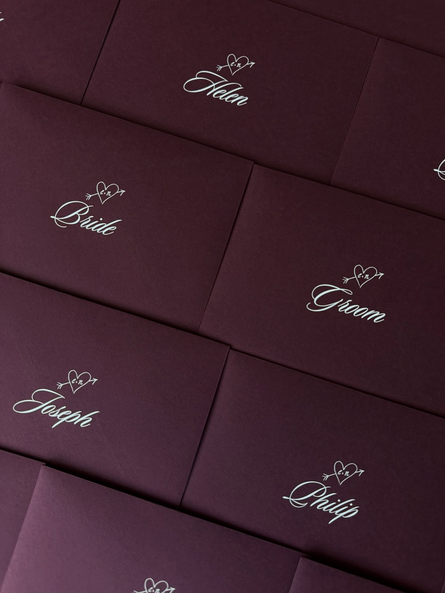 Packing up these beautiful bespoke deep burgundy placename envelopes with illustrated Christmas postcards inside, for Clare &amp; Nathan&rsquo;s special day just before Christmas❣️