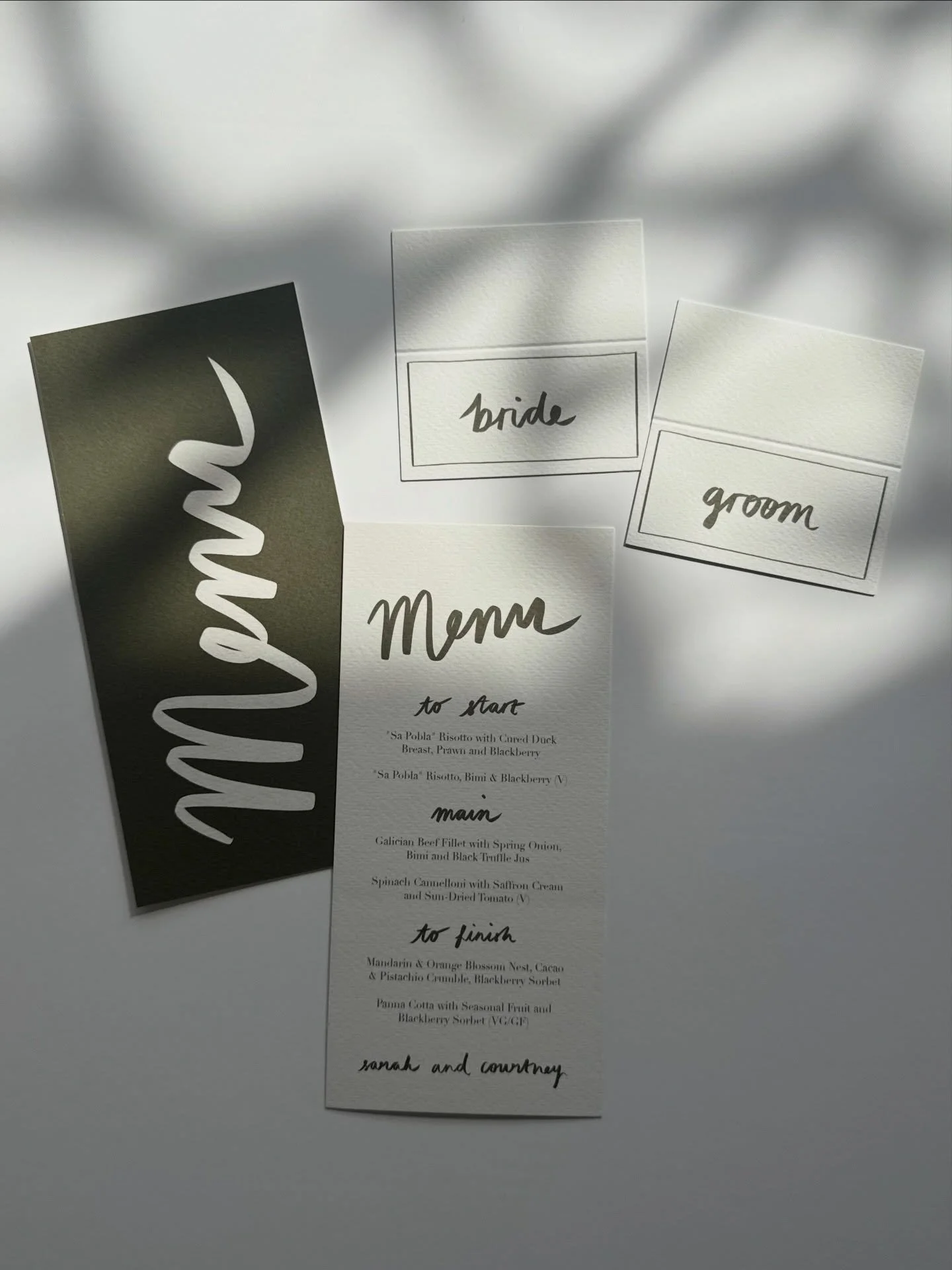 Olive and creamy off white hand lettered menus &amp; placenames for Sarah &amp; Courtney&rsquo;s upcoming Mallorca wedding 🤍