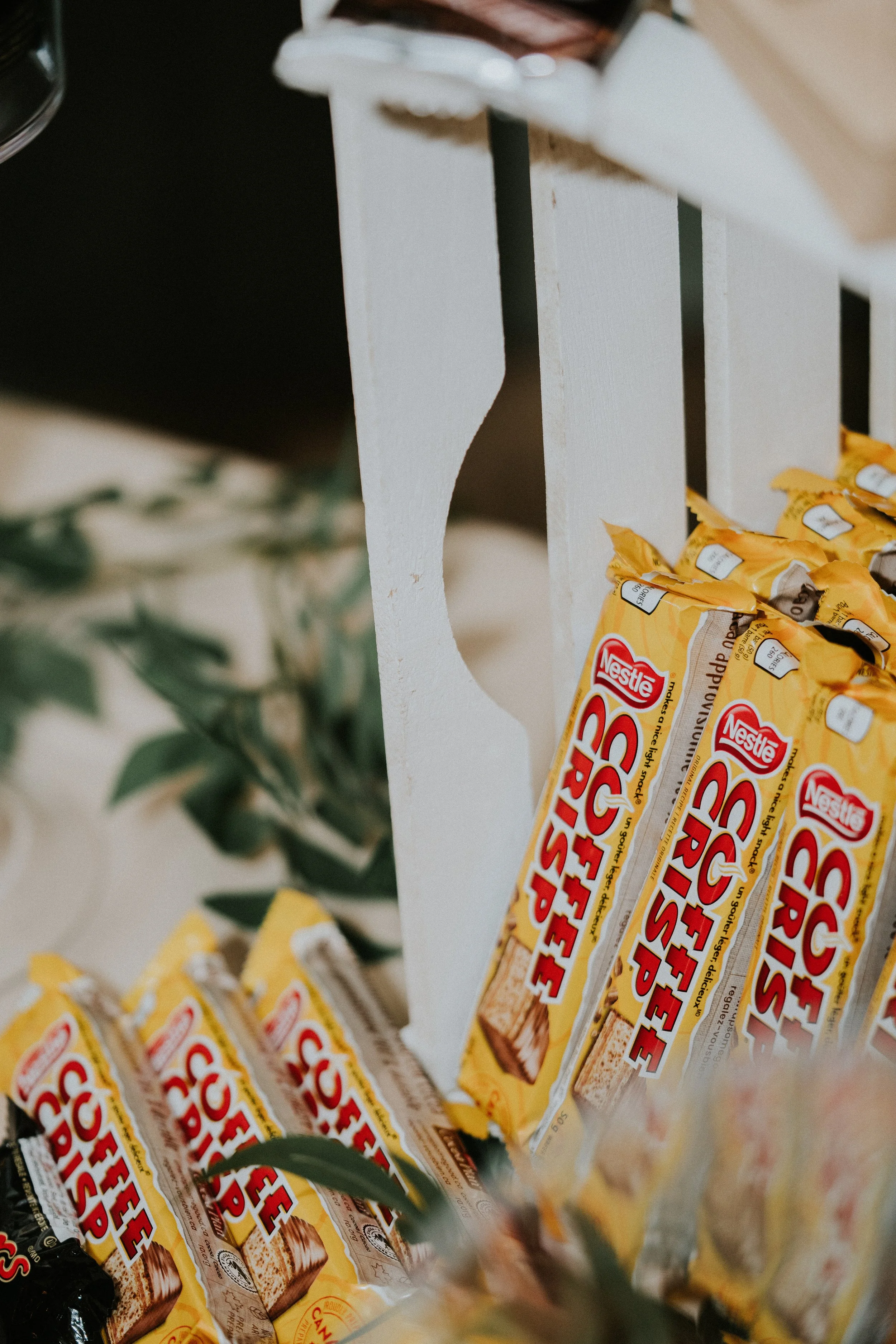 Several packages of Nestlé classic rice snack bars displayed on a shelf.