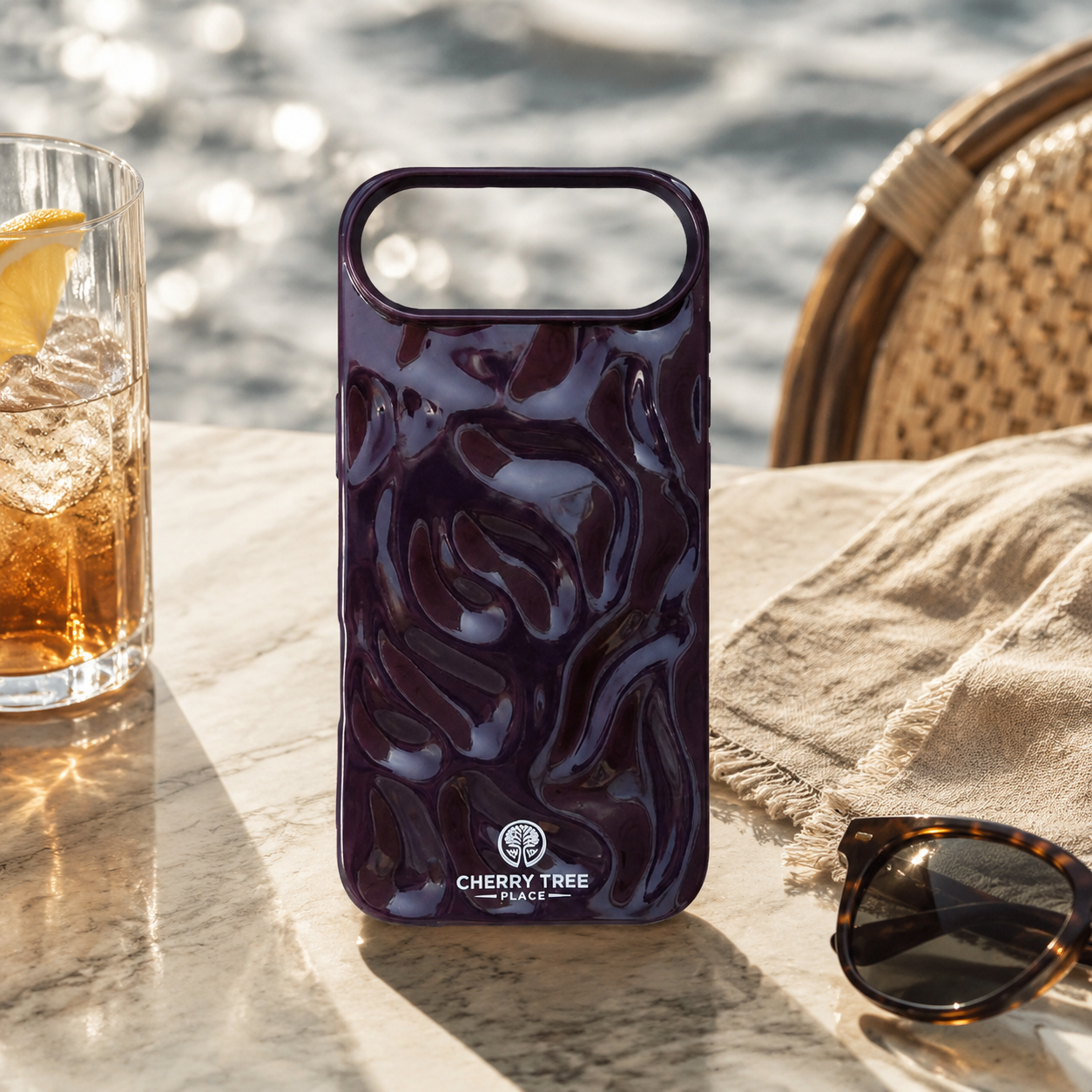 Glossy aubergine ripple phone case.png