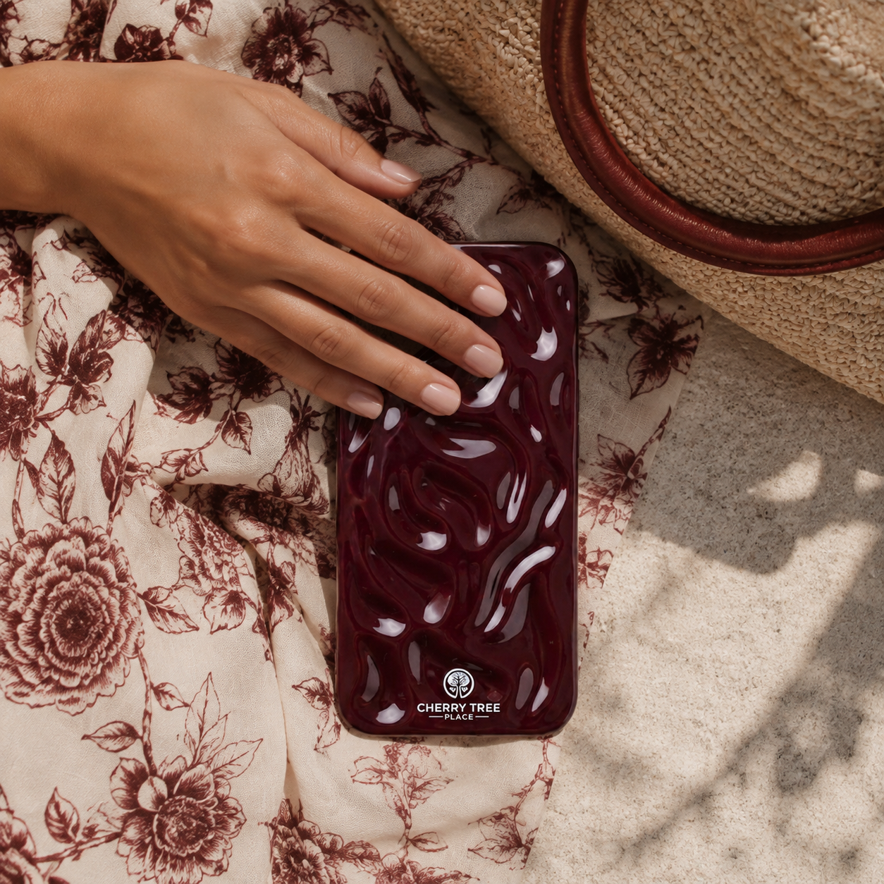 Burgundy Cherry Tree Place resort flat-lay.png