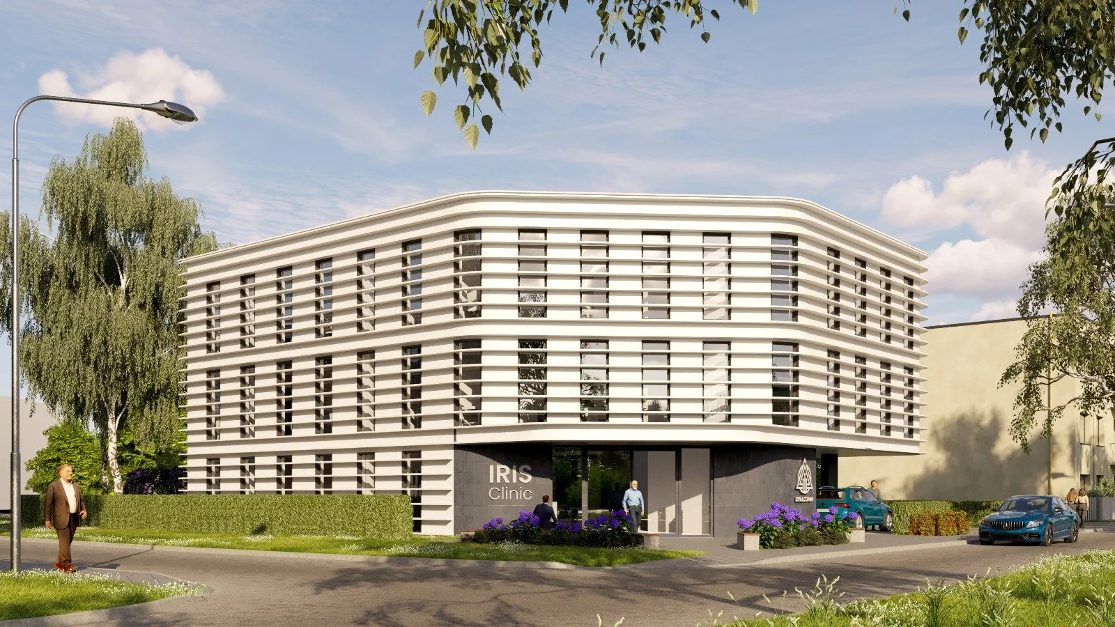 Modern white building with multiple windows and curved architecture, labeled IRIS Clinic, surrounded by trees, cars, and people on a sunny day.
