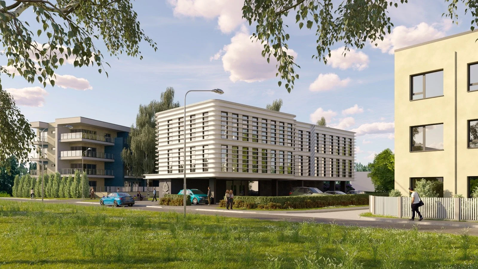 Modern multi-story residential buildings surrounded by greenery, with people walking and cars parked outside on a sunny day.