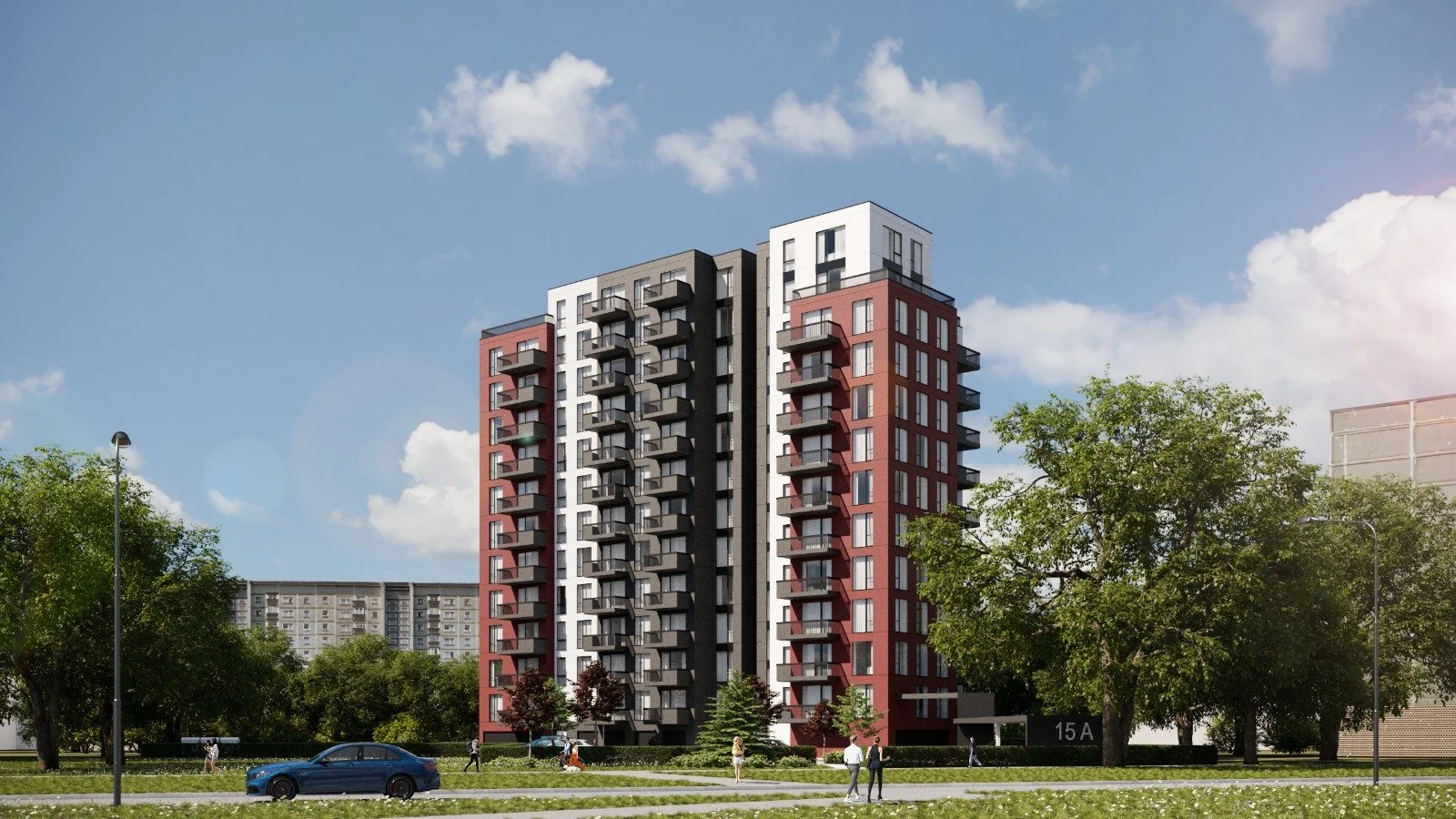 A modern multi-story apartment building with red, black, and white sections, surrounded by green trees, with a car parked in the foreground and people walking nearby. Clear blue sky with scattered clouds.