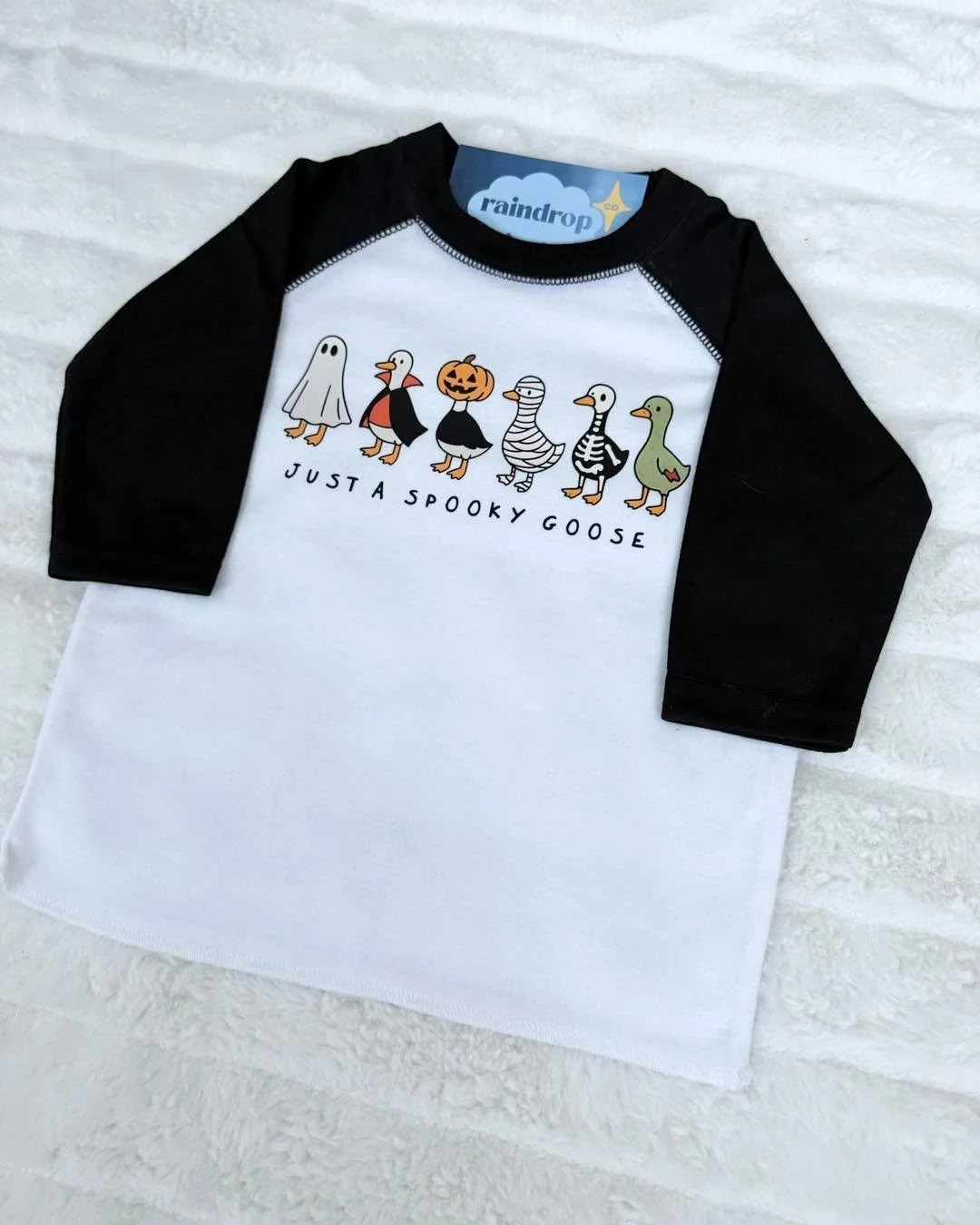 👻✨ New Halloween Tees Just Blew In! ✨👻

This year we&rsquo;re keeping things spooky-cute AND a little faith-filled. Two brand new designs are here:

🪿 Just a Spooky Goose (kids) &ndash; A gaggle of geese in their Halloween best, because nothing sa