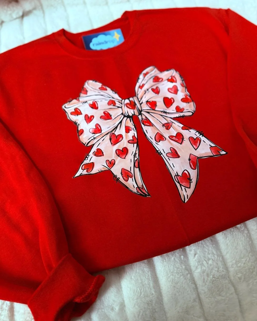 Love is still in the forecast &mdash; but time is running out ☔️💘
Final week to order Valentine&rsquo;s Day shirts and designs!

Don&rsquo;t miss your chance to grab something sweet for your little loves 🤍
Order here 🌦️: www.theraindropco.com

#va