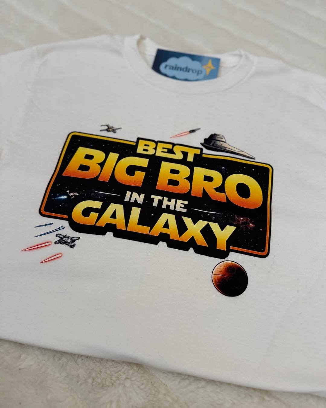 Some tees are more than just tees &mdash;
they&rsquo;re part of a memory in the making ☁️

#bigbrothertee #Star #Wars #starwars #starwarsfan #starwarsshirt #pressedtee #bigbrotherannouncement #familymilestones #customkidswear #ShopSmall #SmallBusines