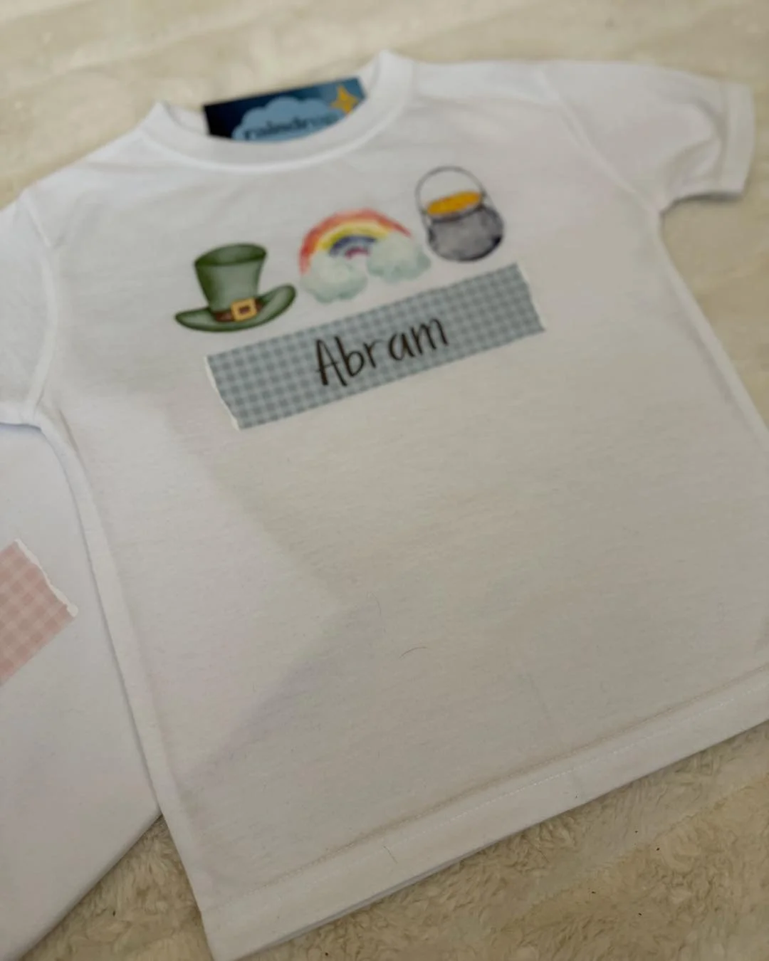 For the little lucky lad 🍀
Personalized and ready for all his St. Patty&rsquo;s adventures! 
Grab yours here: https://www.theraindropco.com/chasingrainbows/p/luckyladnametee

#stpattys #stpattysday #stpattysoutfit #stpattysoutfitinspo #stpattysoutfi
