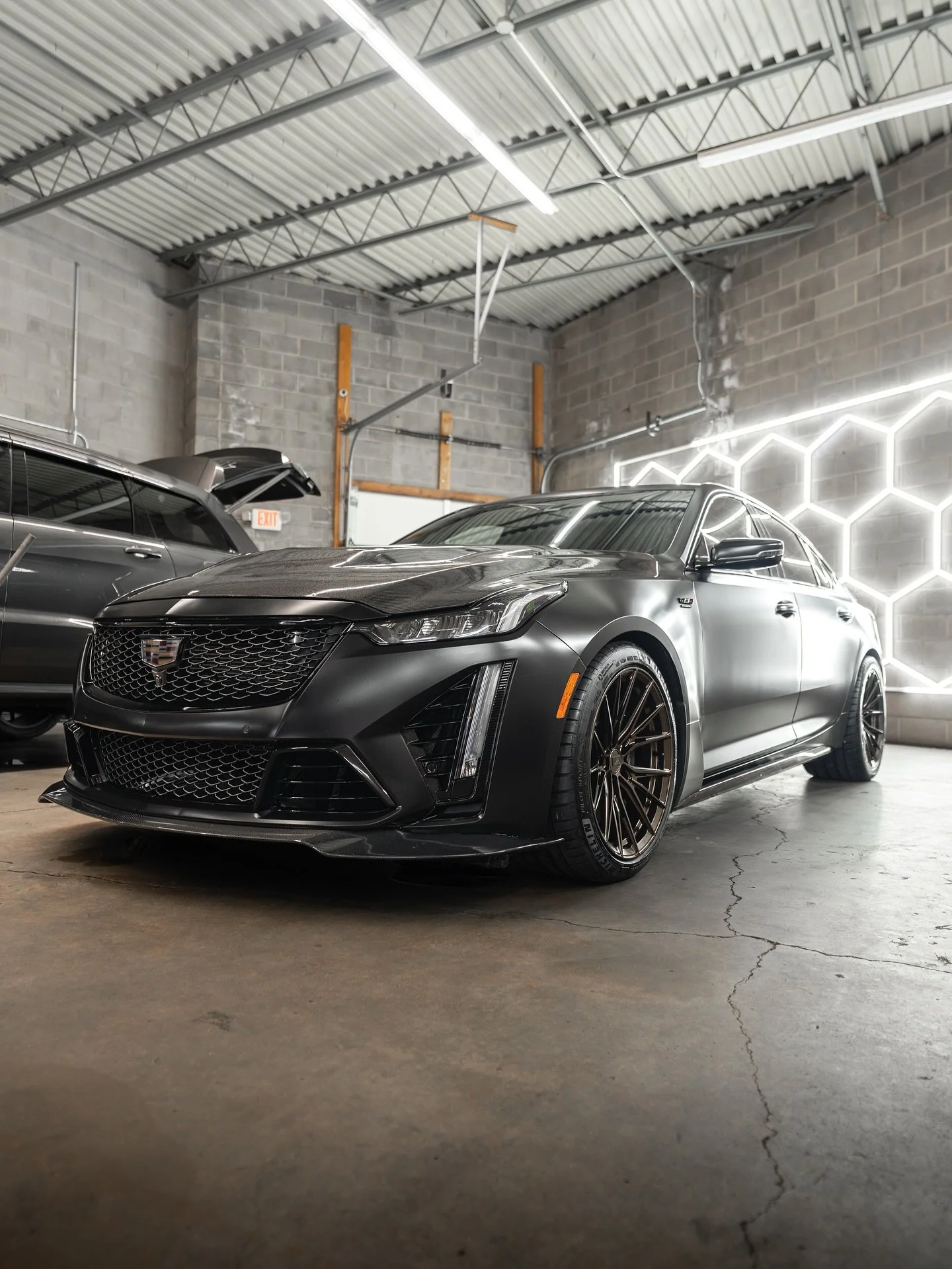 The 2022 Cadillac CT5-V Blackwing just touched down at WoksDetailing for a full transformation:
🖤 Satin black vinyl wrap
🔩 Aggressive new wheel &amp; tire setup
⚫️ Full carbon fiber package

Refined. Reimagined. Reinforced. 
📸: @nesheimvisuals 
#W