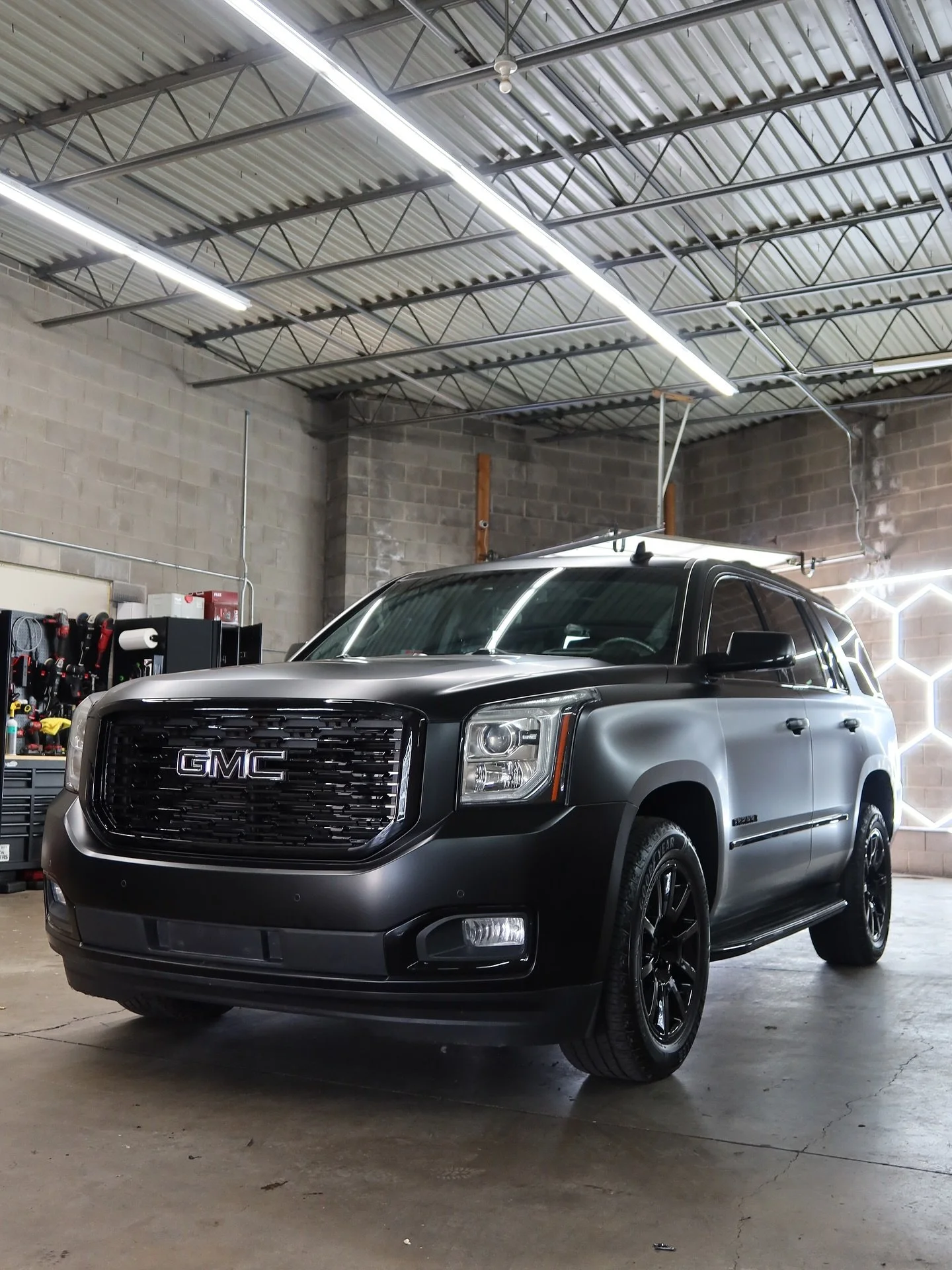 Blacked out and built to impress. 👏
This 2017 Yukon Denali is officially murdered out:
✅ Full chrome delete &mdash; grille, roof rack, trims
✅ Satin black wrap
✅ Gloss black powder-coated wheels
✅ Gloss black emblems

From chrome to complete stealth