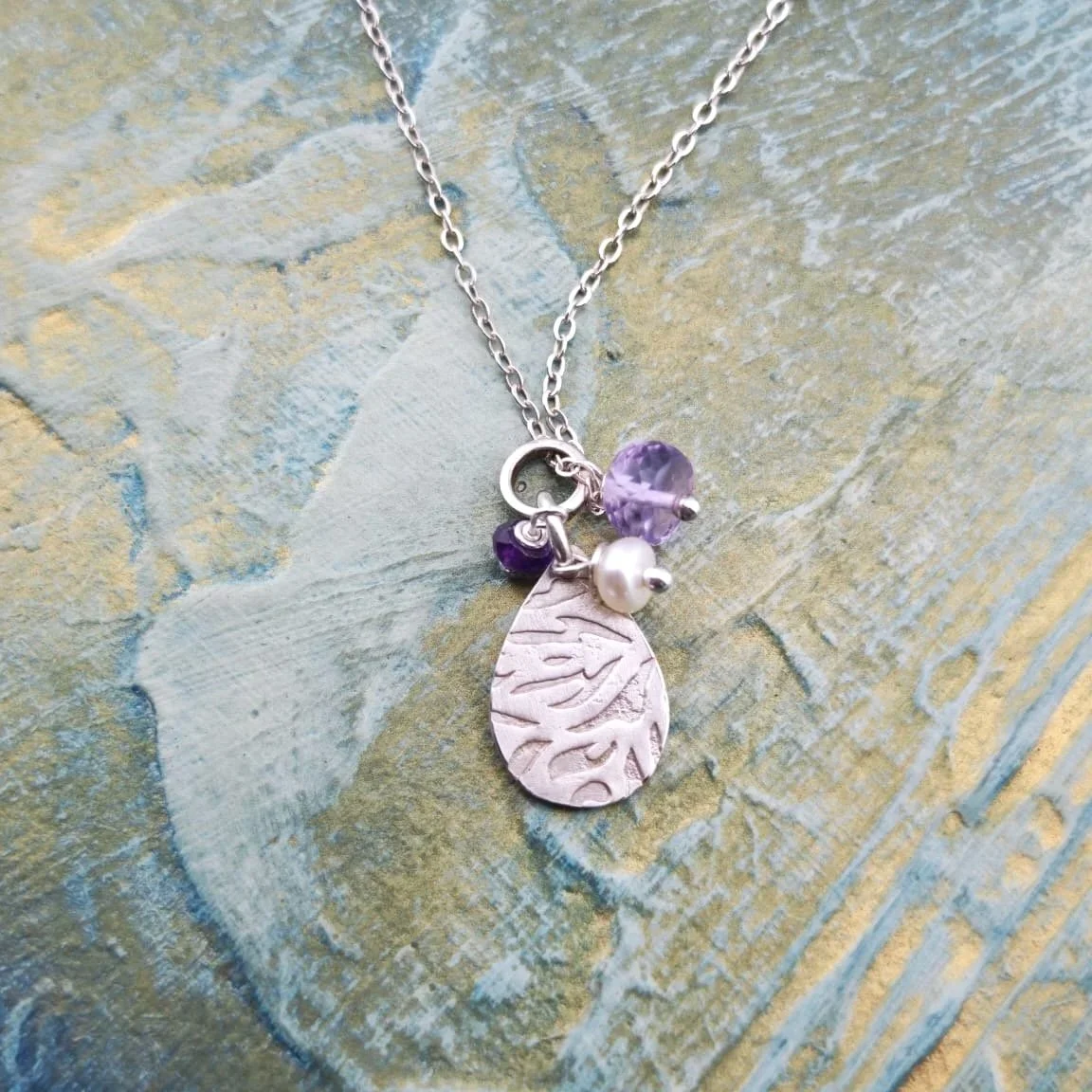 Silver Teardrop Pendant with Amethysts and a Pearl