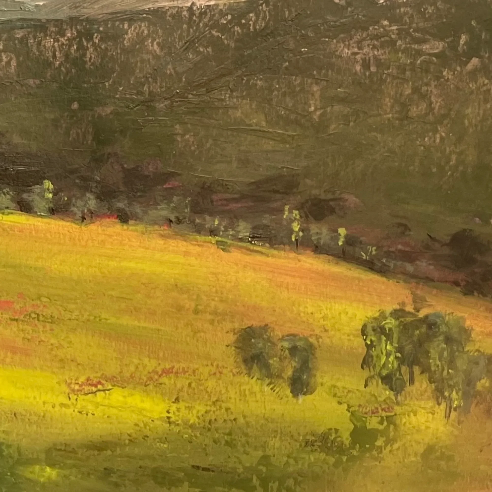 Muted atmospheric blues and receding mountain forms in Held Light by Andrew Bowers