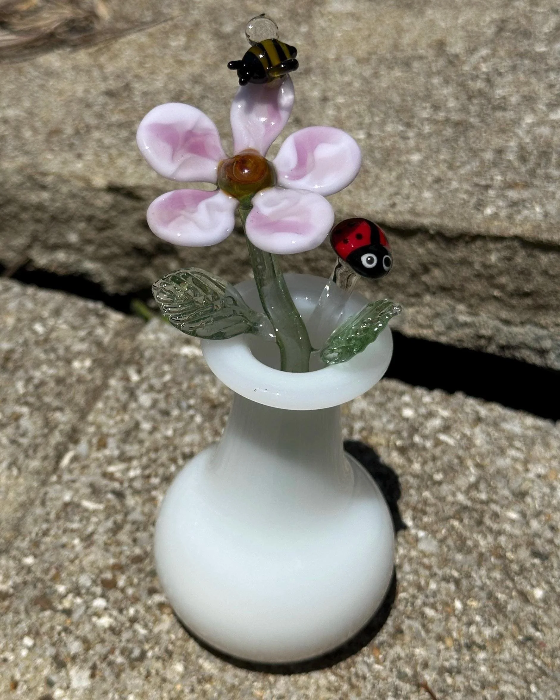 Handmade Glass Flower with Bee and Ladybug Stir Stick in Jade White Vase.