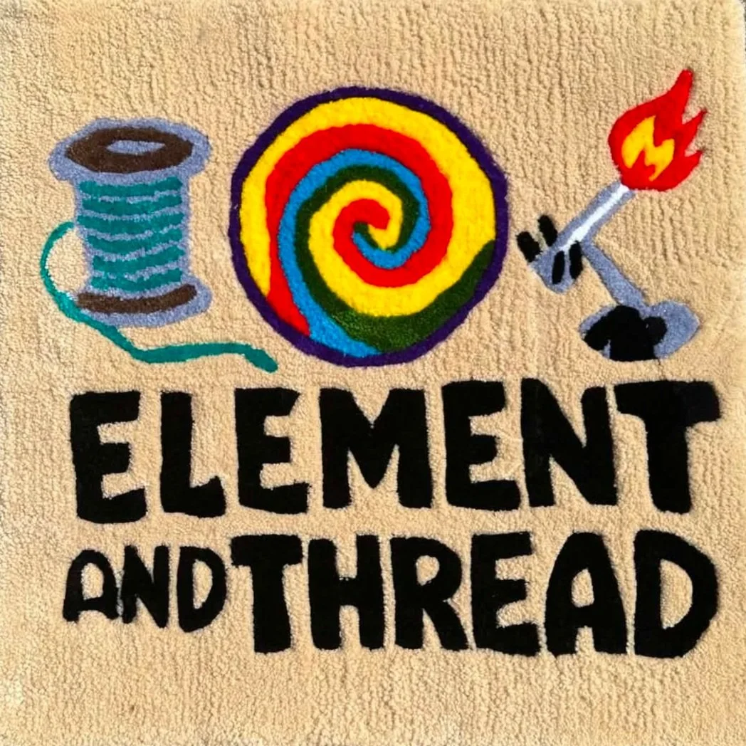 Colorful embroidered design featuring a spool of thread, a colorful spiral, and a lit lighter with a flame, along with the text "Element and Thread" in bold black letters.