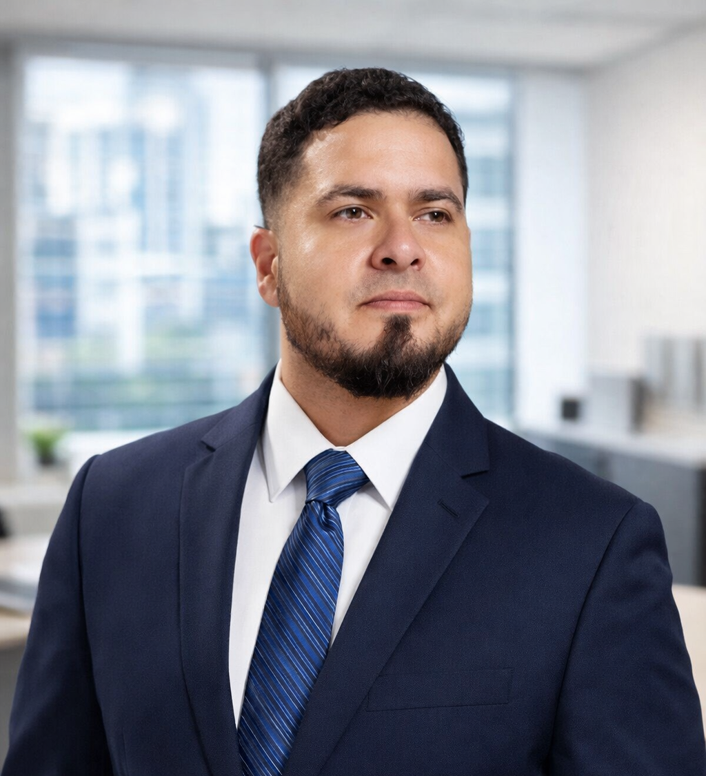 Portrait of a man in a business suit standing in an office