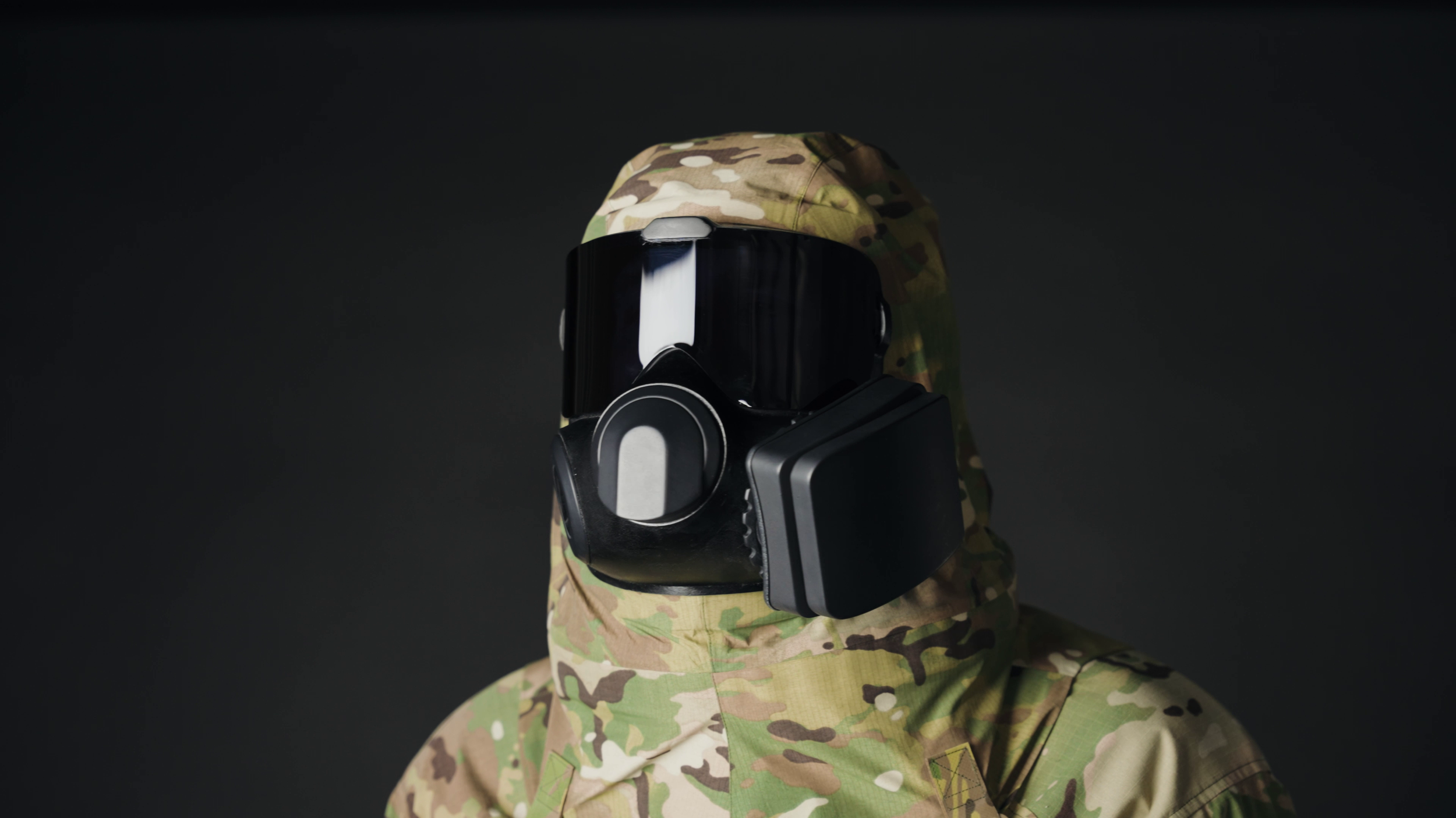 Side View CN/CS Gas Filter on User in Bearded Tactical Applications Mask - Military Operations