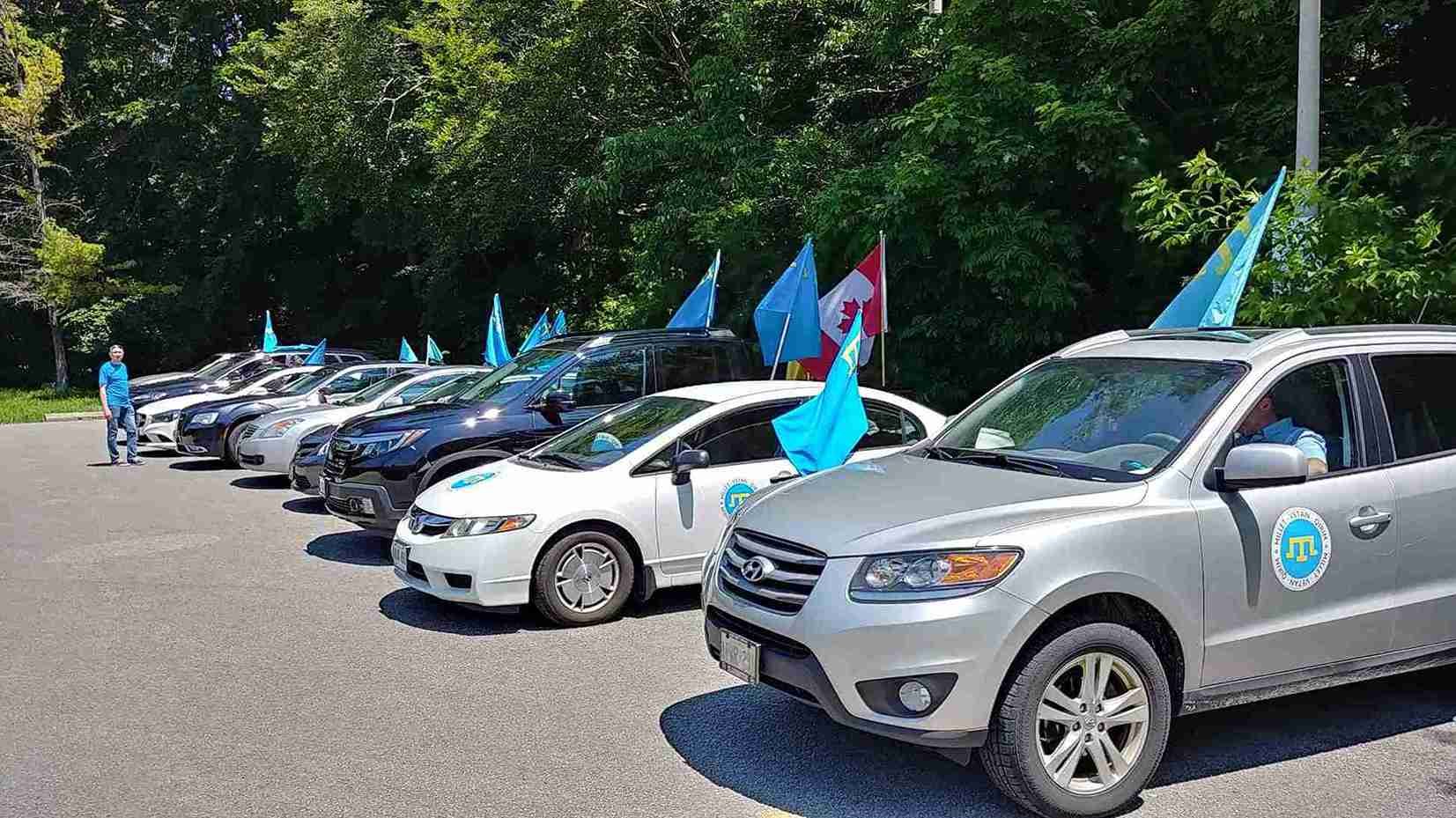 Community members gather in solidarity for the Crimean Tatar Flag Day in Toronto.