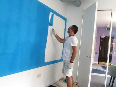 Painting & Creating a whiteboard dry erase board area in a London office with blue paint