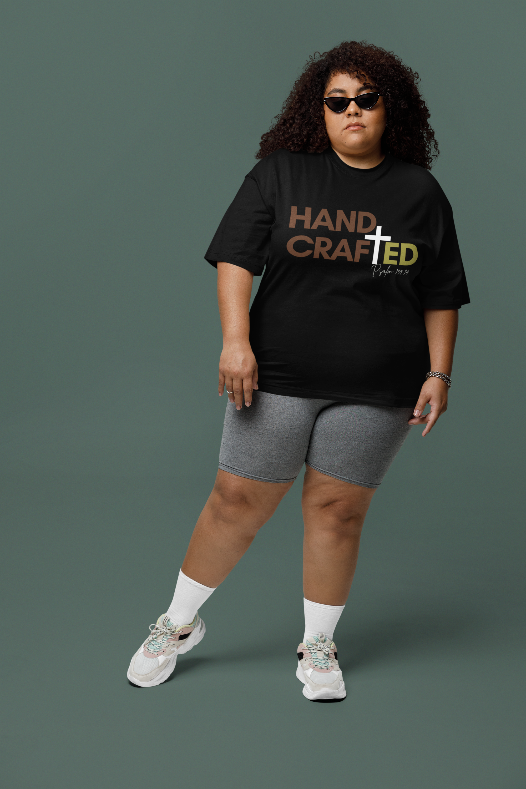 mockup-of-a-woman-with-curly-hair-wearing-a-plus-size-t-shirt-and-sunglasses-m38905.png