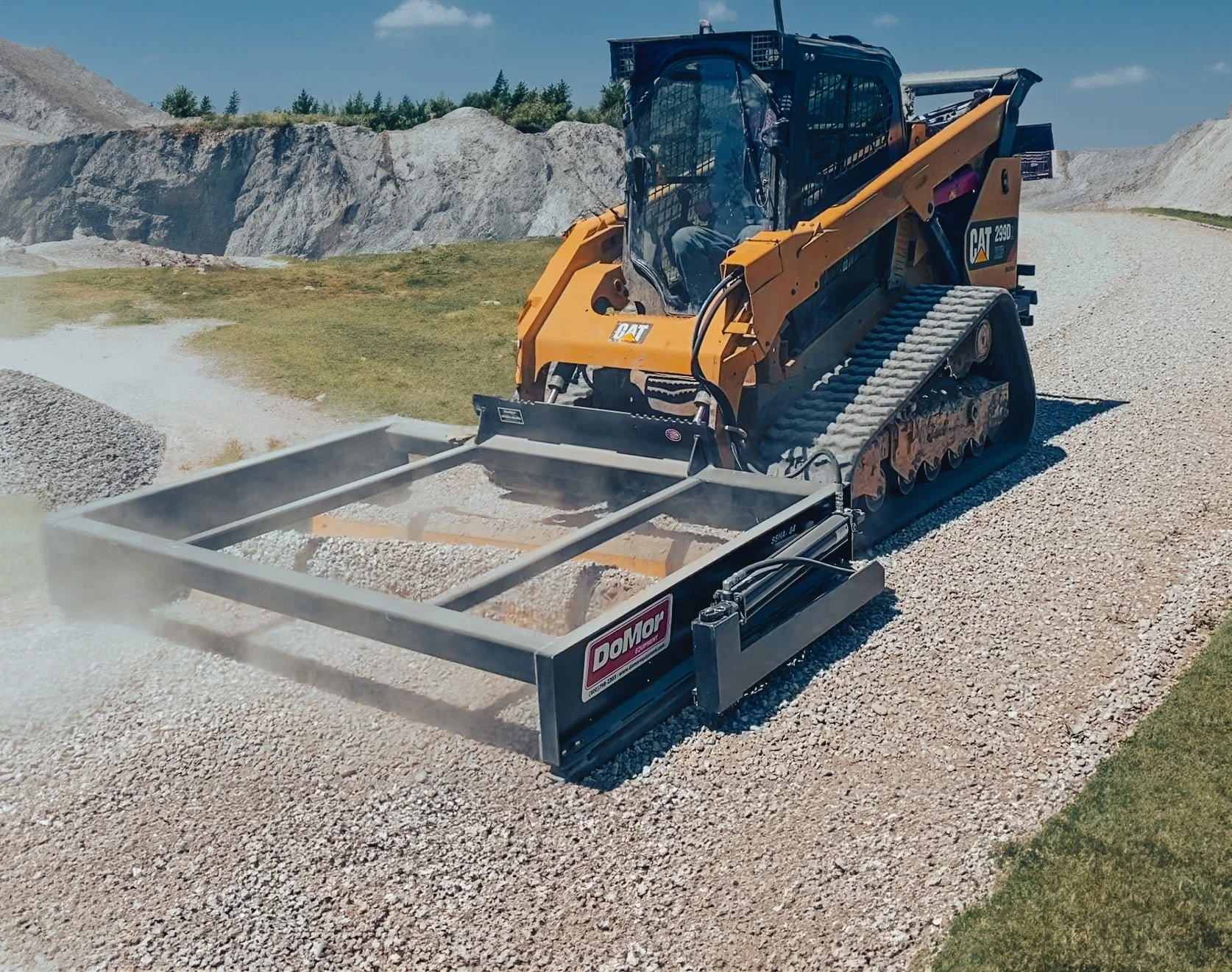 Operator using skid steer to grade and smooth land for driveway, pasture, or building pad.