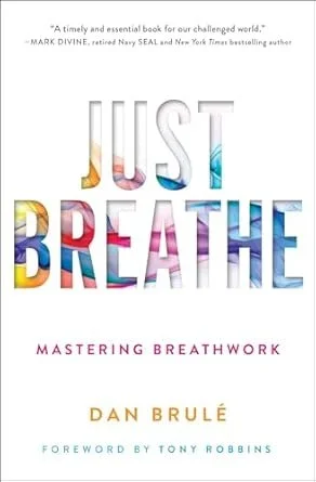 Book cover titled "Just Breathe: Mastering Breathwork" by Dan Brulé with a foreword by Tony Robbins. The title features colorful, gradient letters.