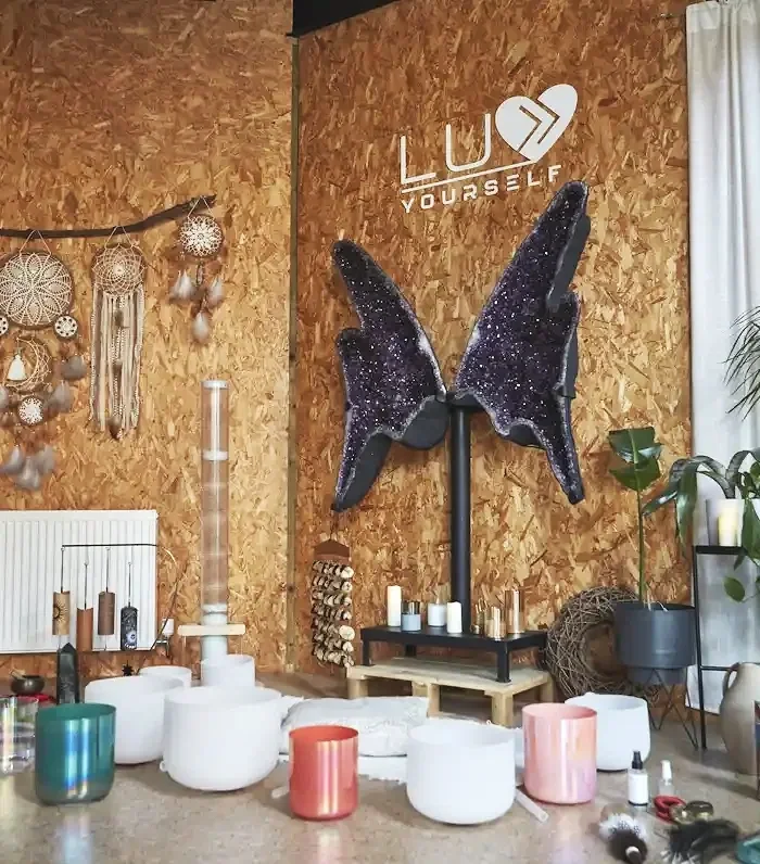 Serene space in East London filled with plants and crystals, abundant in natural light and spacious, ideal for video and photo shoots.