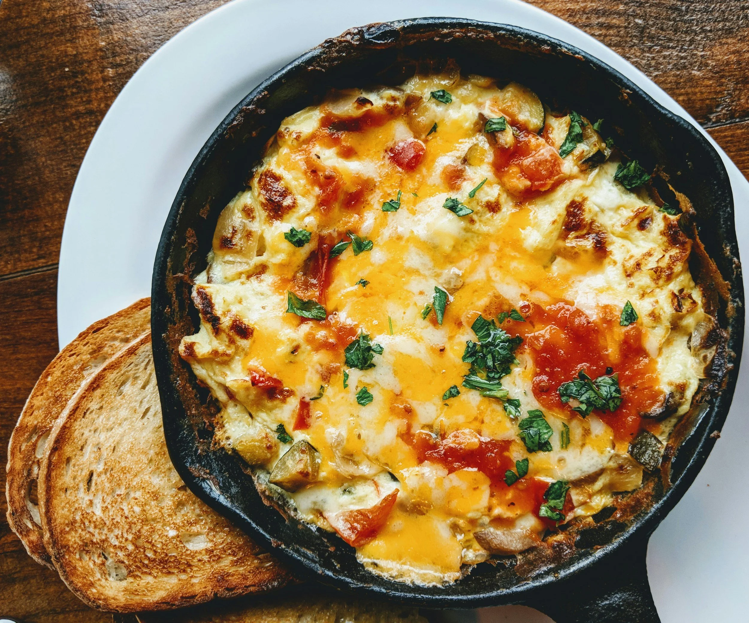 Breakfast skillet with toast.