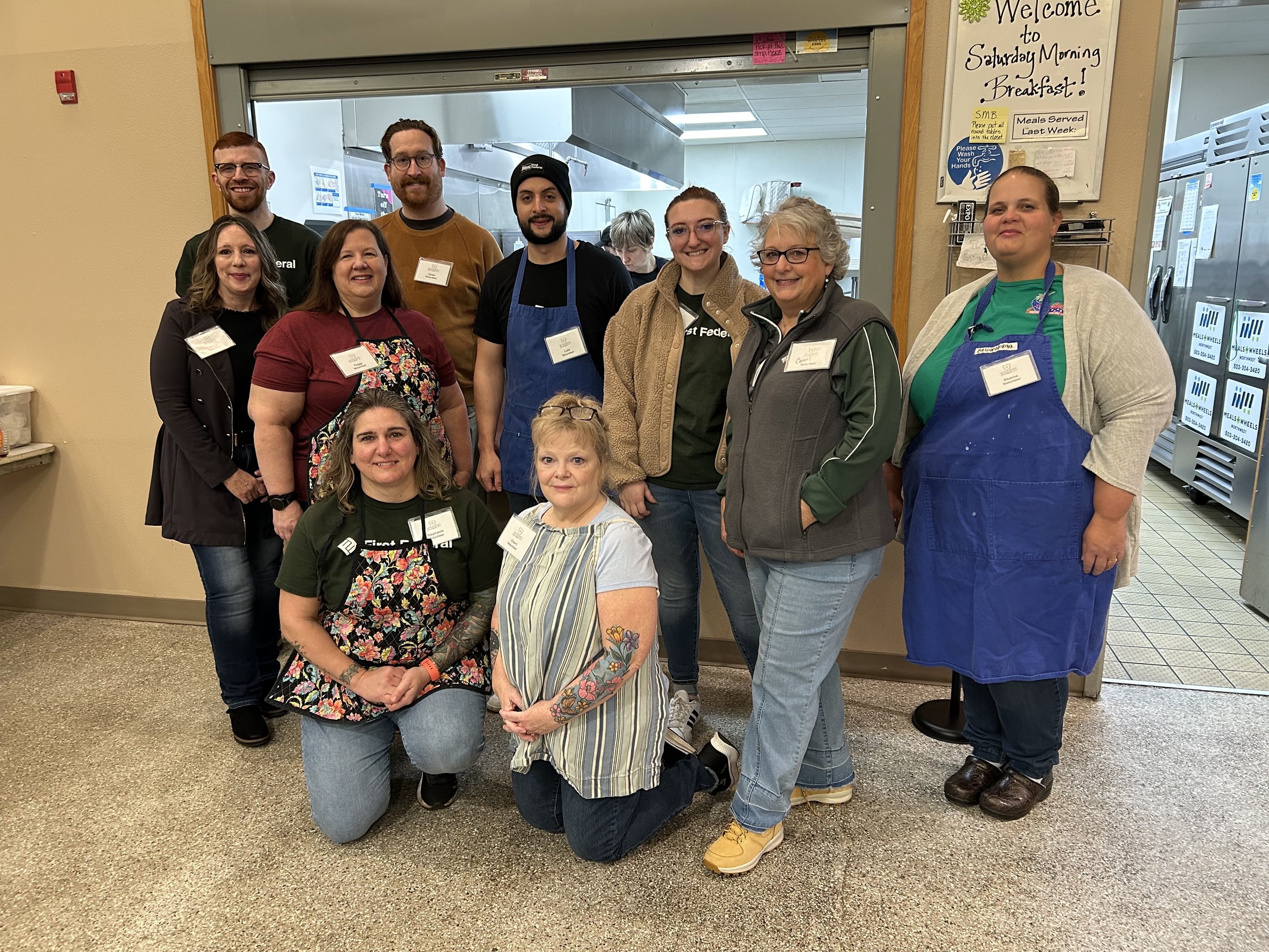 A group of volunteers from First Federal serving at SMBinMac.