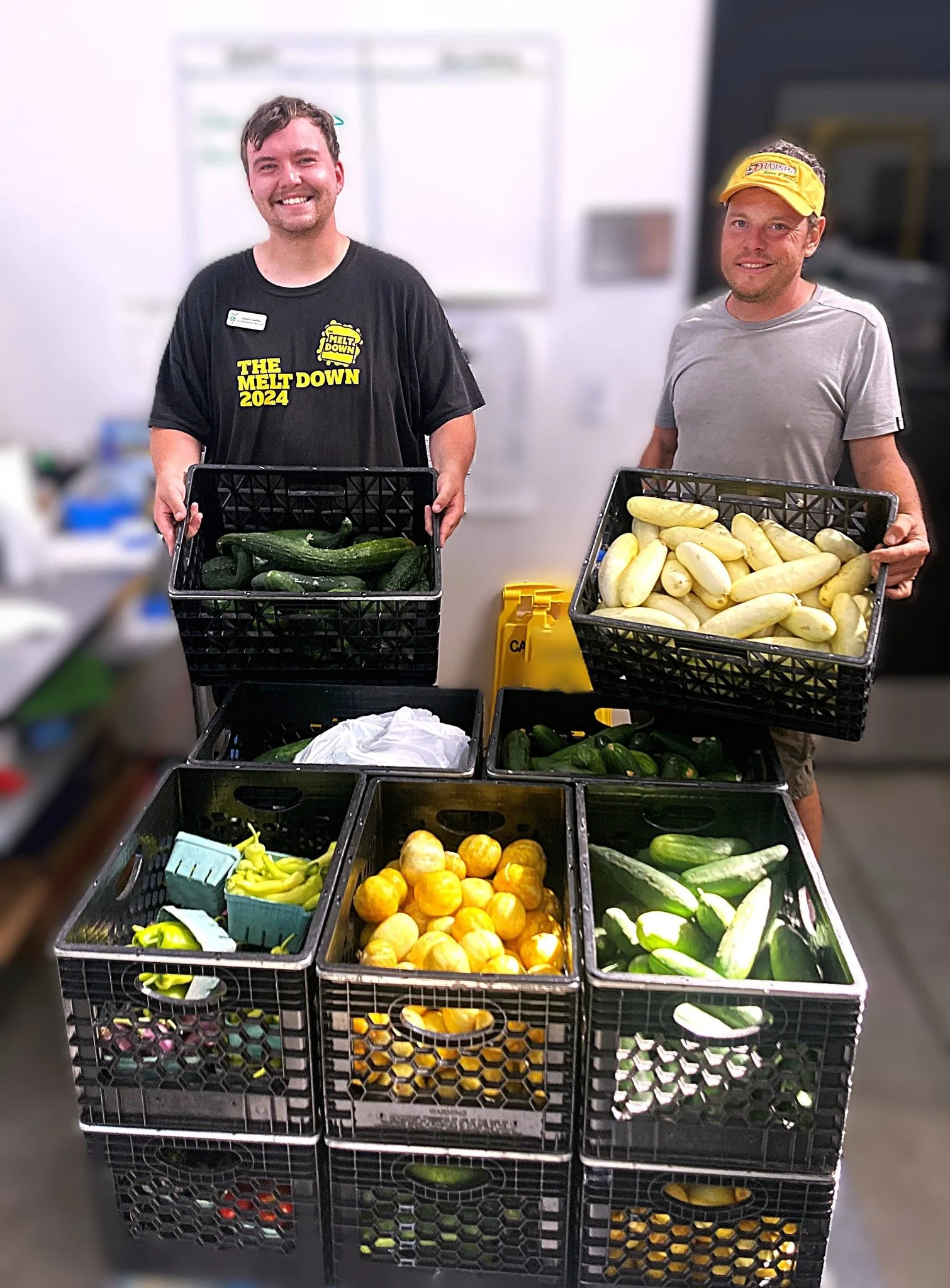 Men from McMinnville Oregon YCAP pose with donated food for their nonprofit.