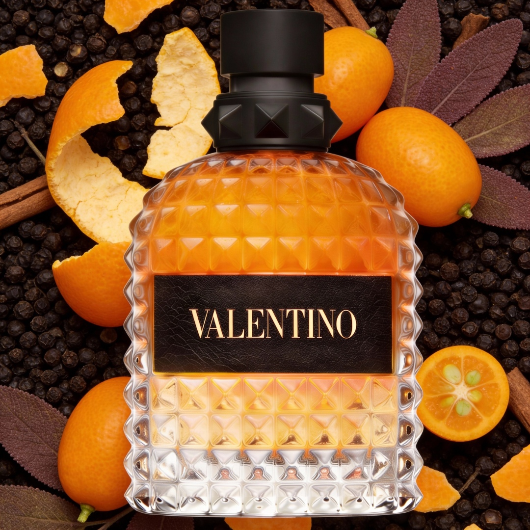 Born in Roma Idyllic Sunrise Uomo by Valentino – Eau de Toilette for Men, dark geometric bottle surrounded by kumquats and spices with black leather details, ScentLab prospective concept by WSSC