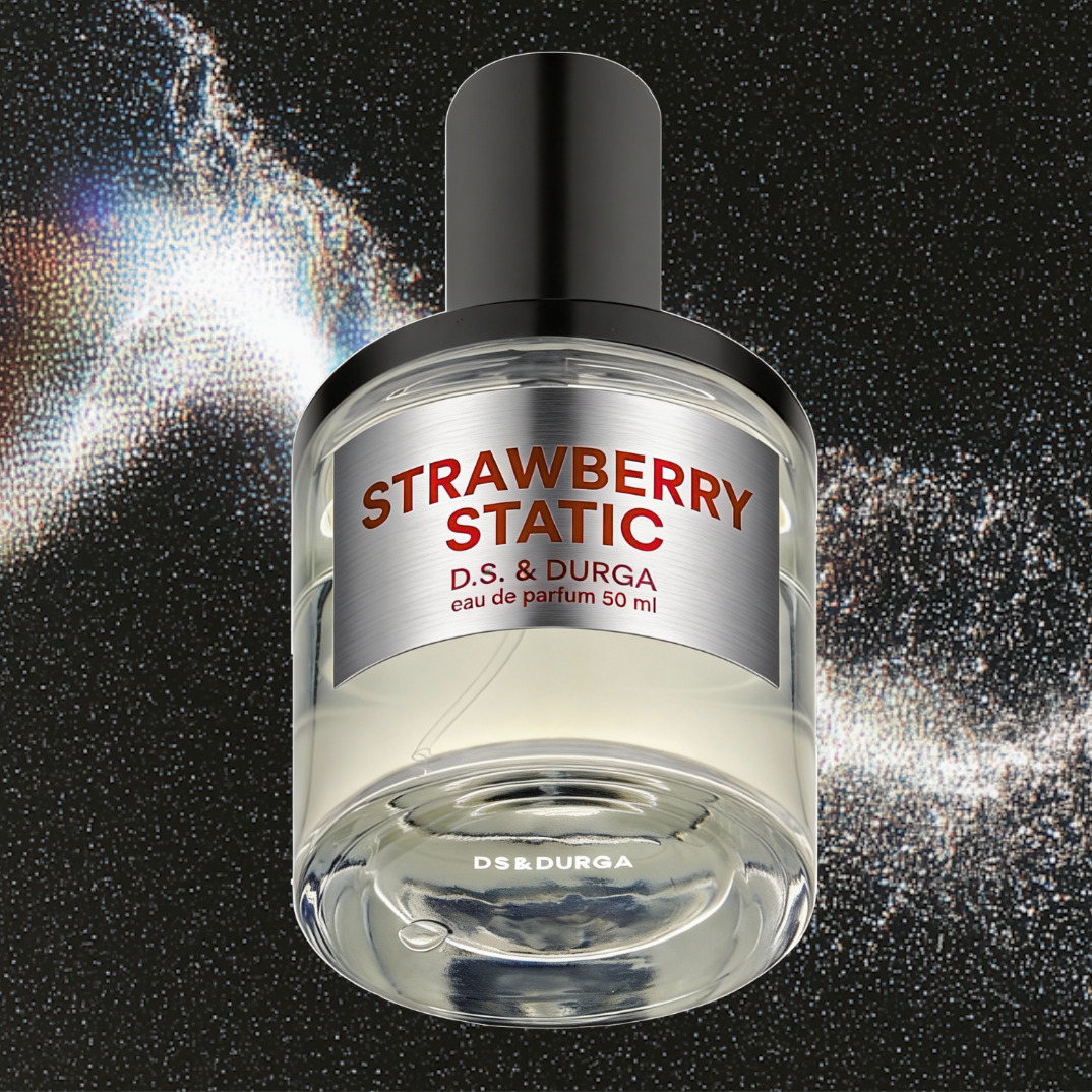 Strawberry Static by D.S. & Durga – Unisex Eau de Parfum, cylindrical glass bottle with black cap surrounded by electric sparks and light diffraction, Brushed Silver effect label with metallic lettering ScentLab prospective concept by WSSC